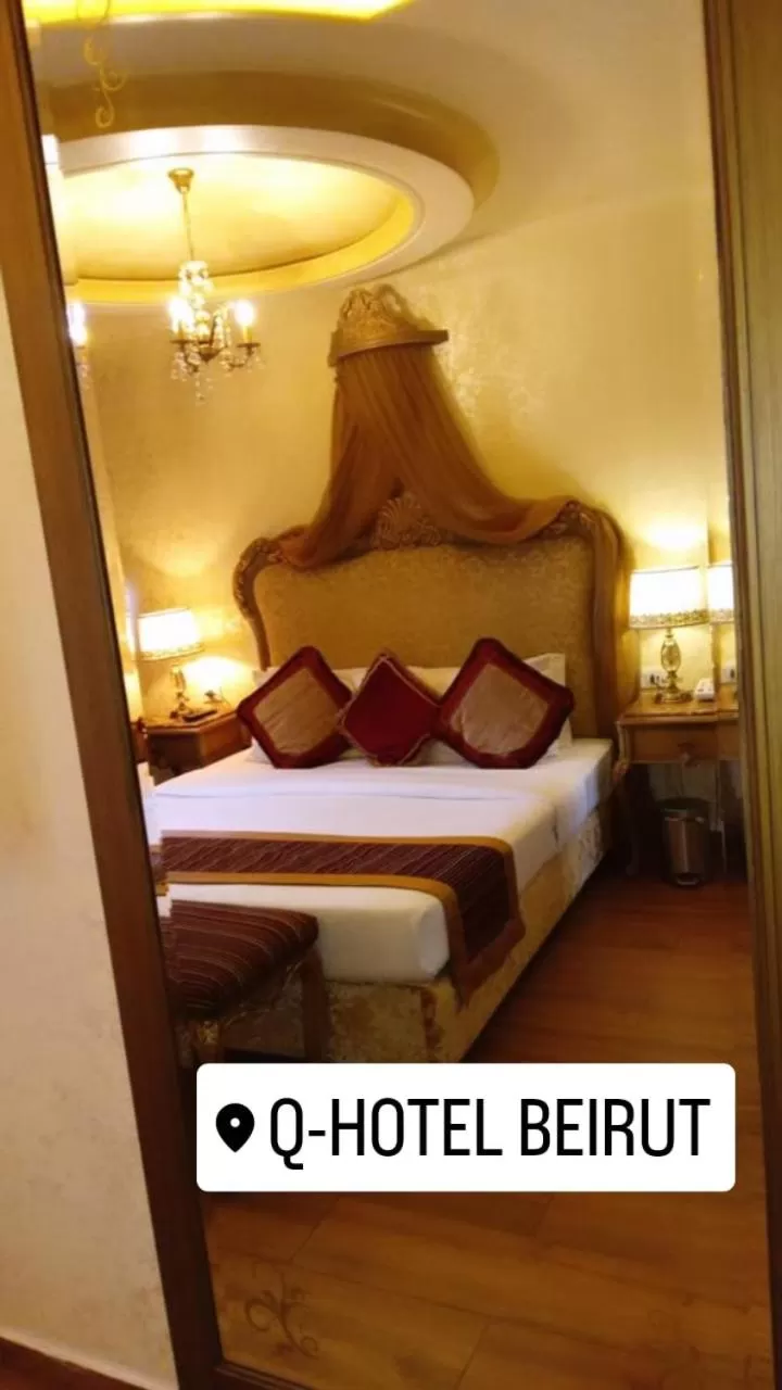 Bedroom, Bed in Q Hotel