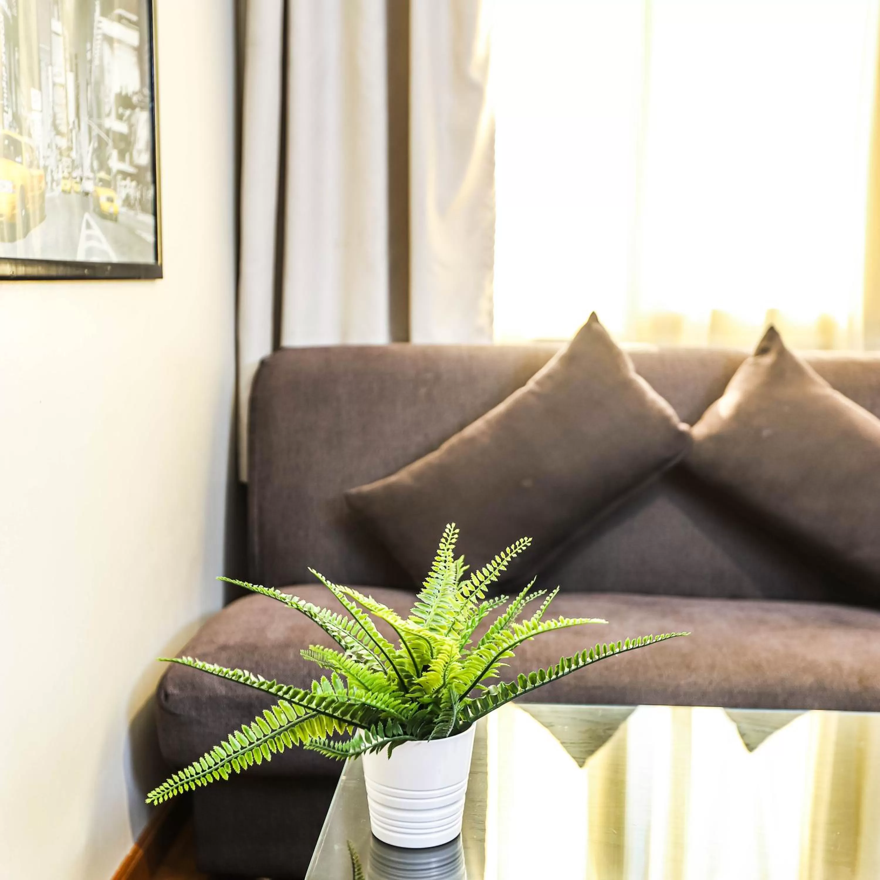 Seating area in NewCity Hotel & Suites