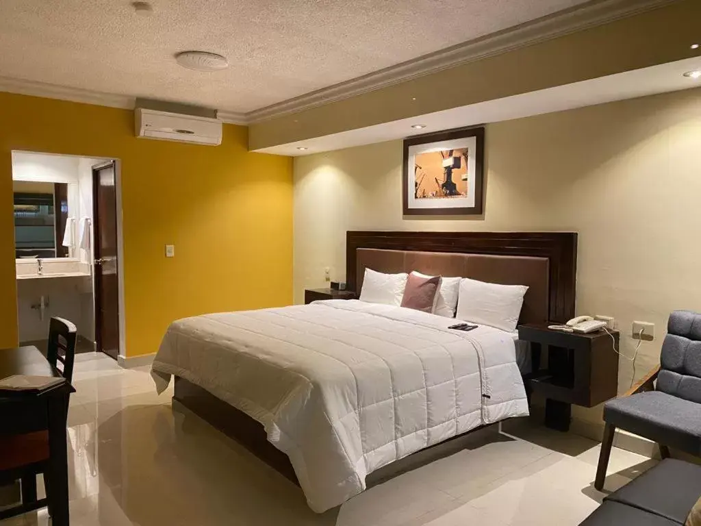 Bed in Hotel San Ignacio Inn