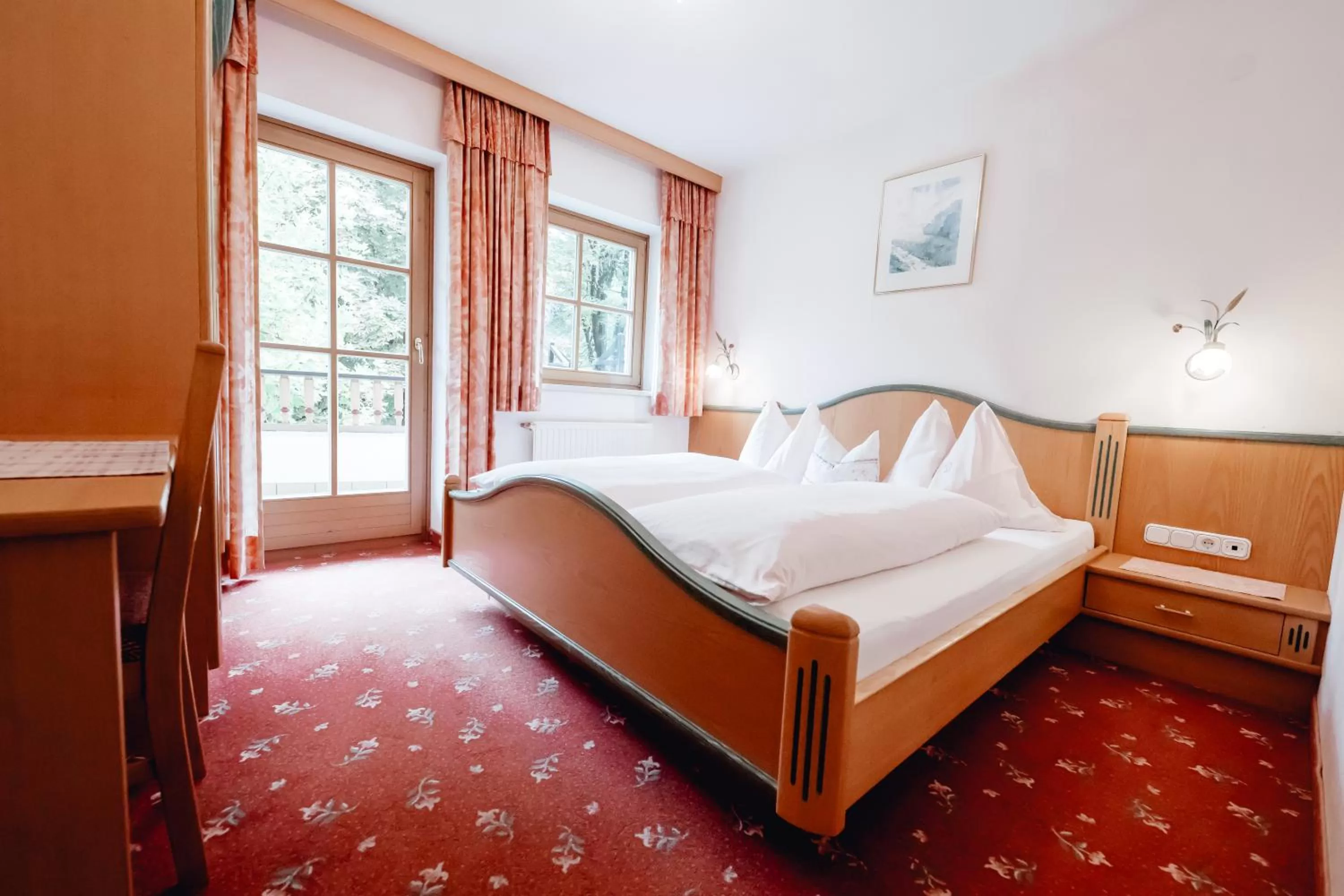 Bed in Zimmer & Ferienwohnungen Dandler