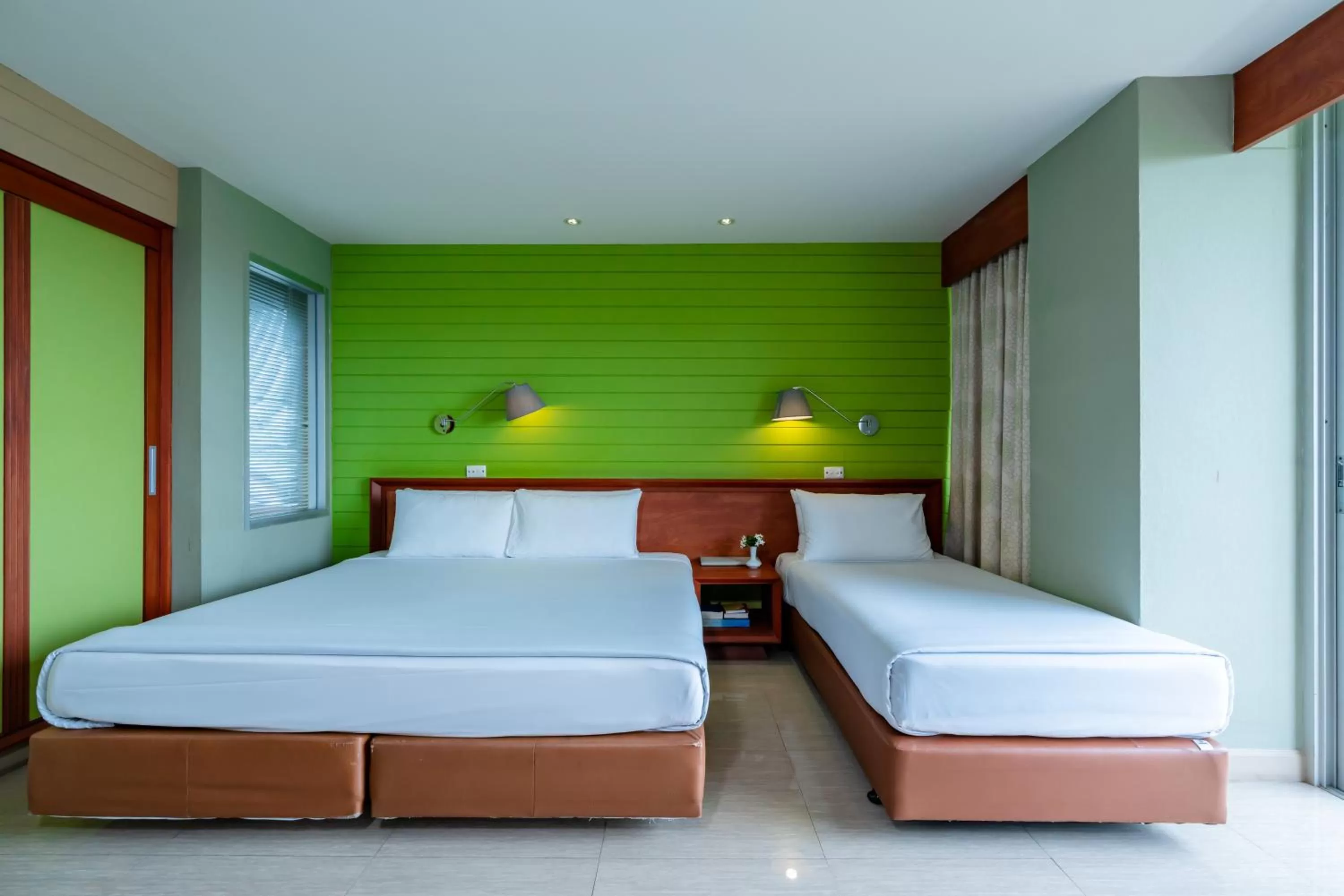 Bed in Long Beach Cha-Am Hotel