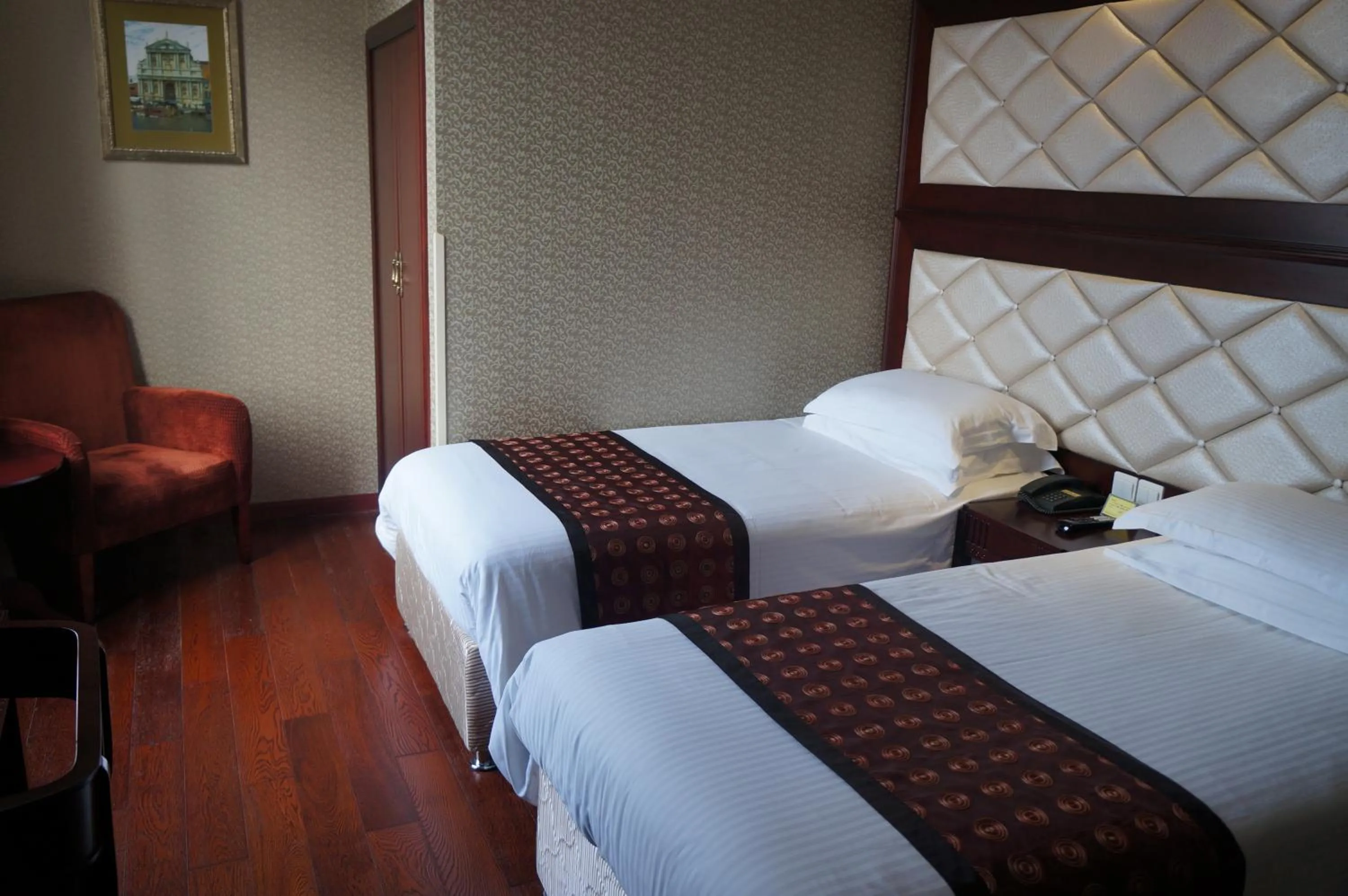 Bed in Seventh Heaven Hotel