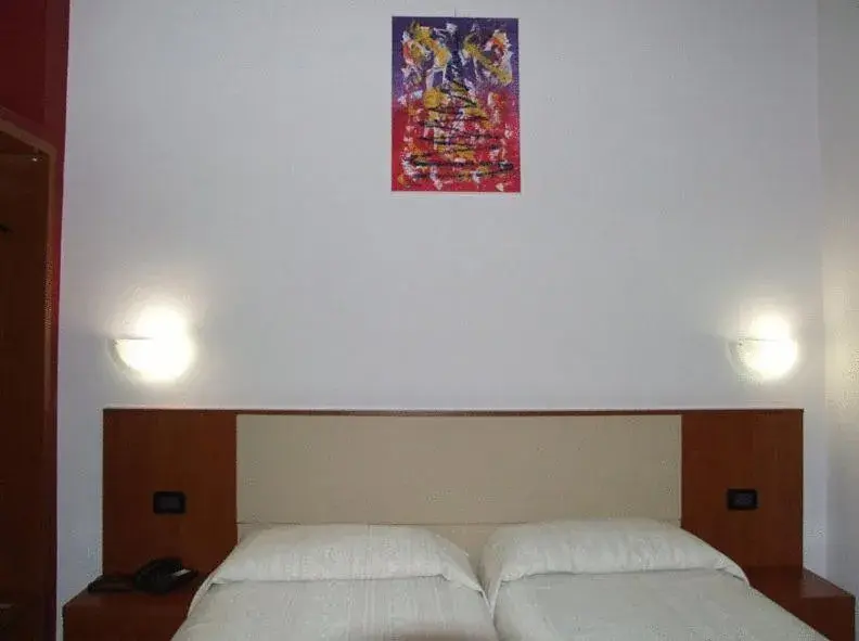 Bed in Eco Art Hotel Statuto