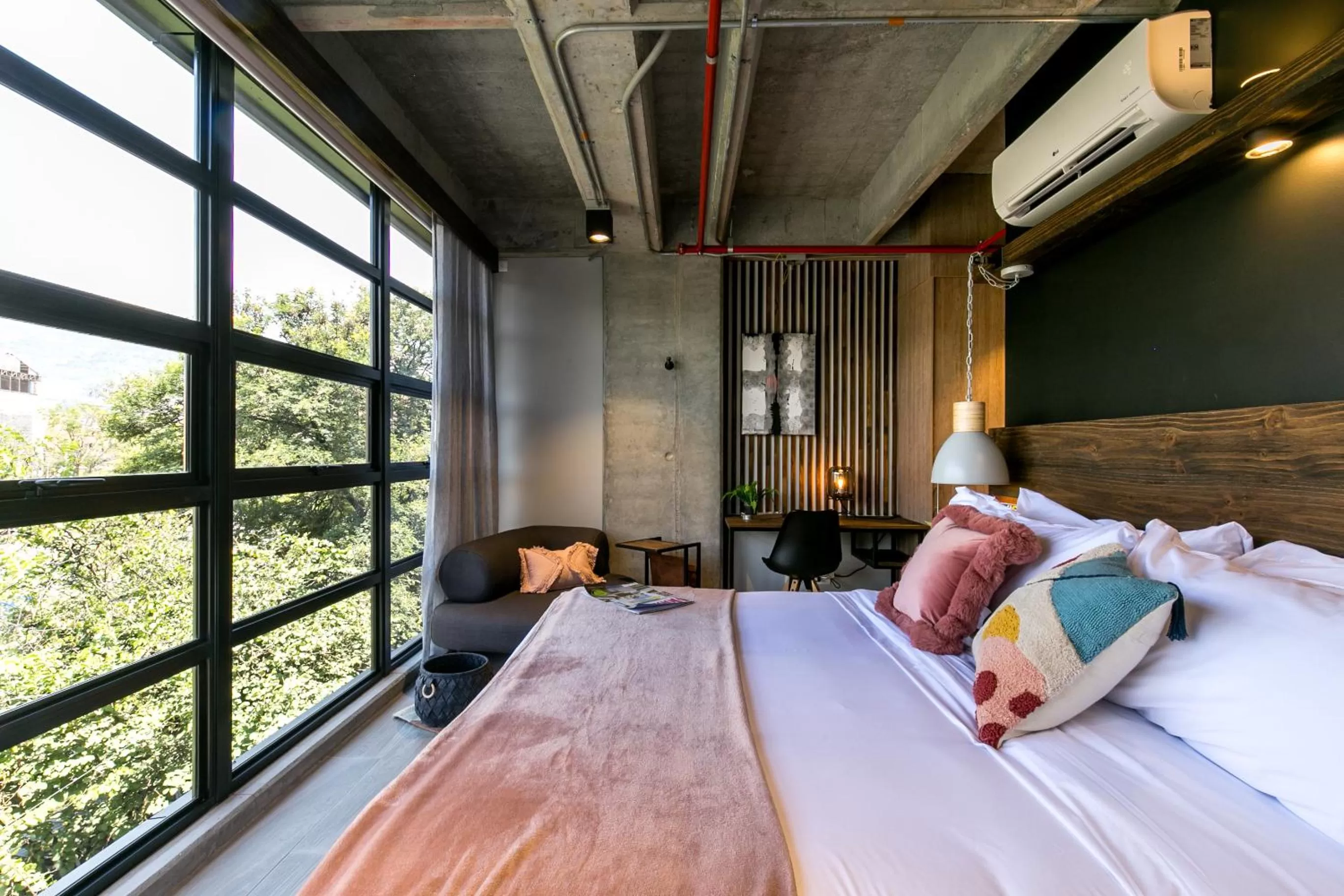 Bed in Factory Lofts Hotel