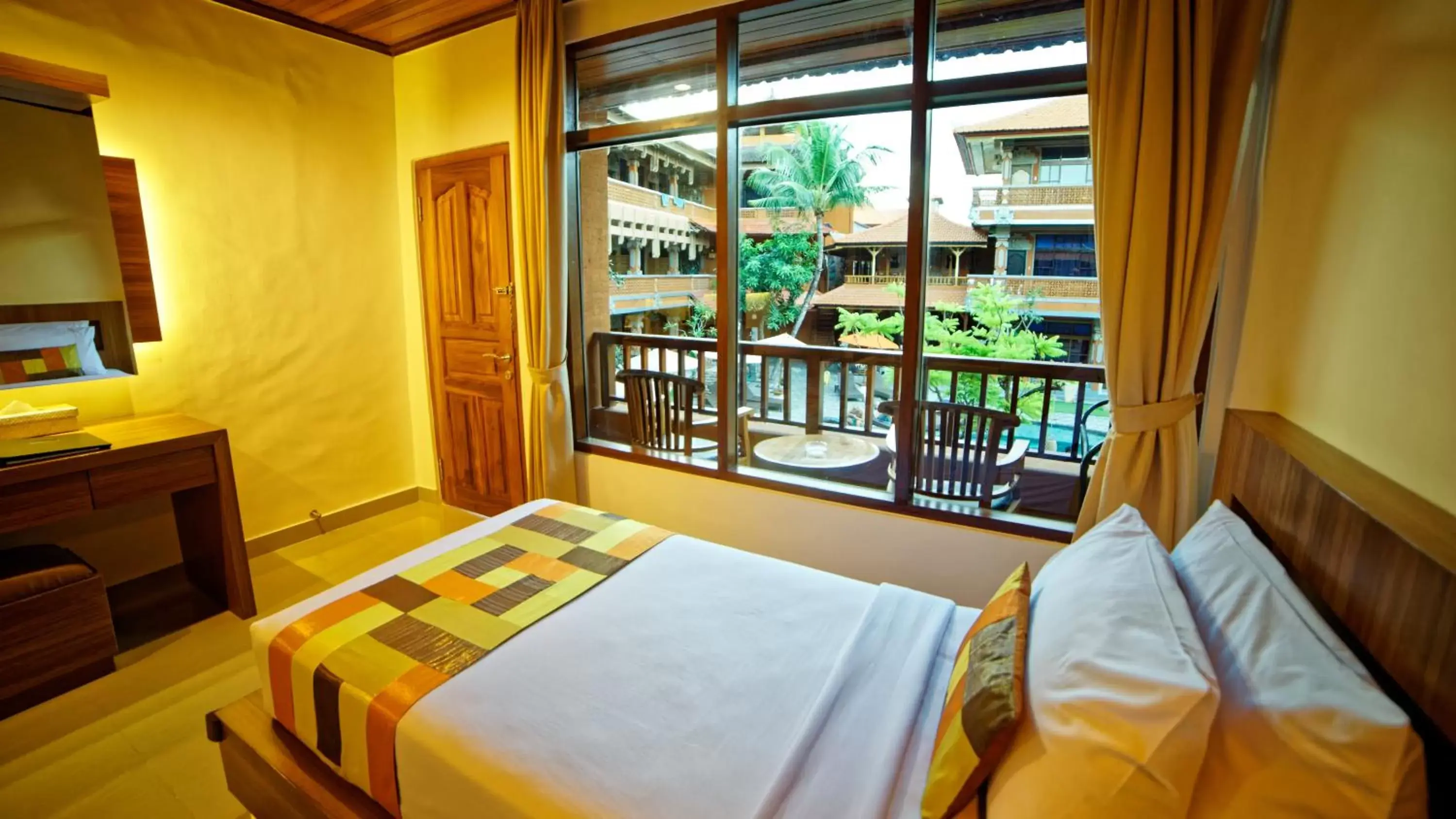 Balcony/Terrace, Pool View in Wina Holiday Villa Kuta Bali