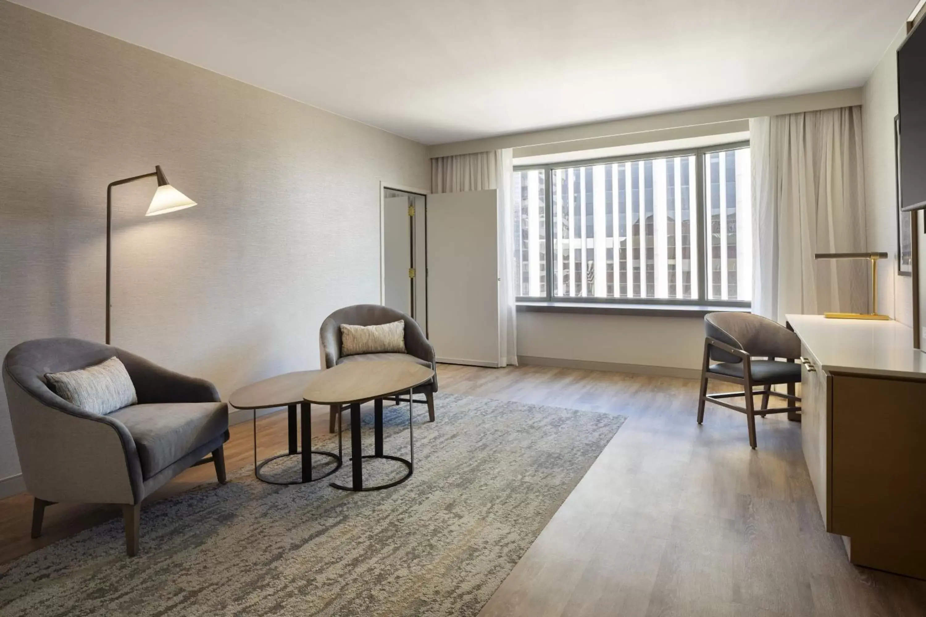 Photo of the whole room, Seating Area in The Westin Denver Downtown