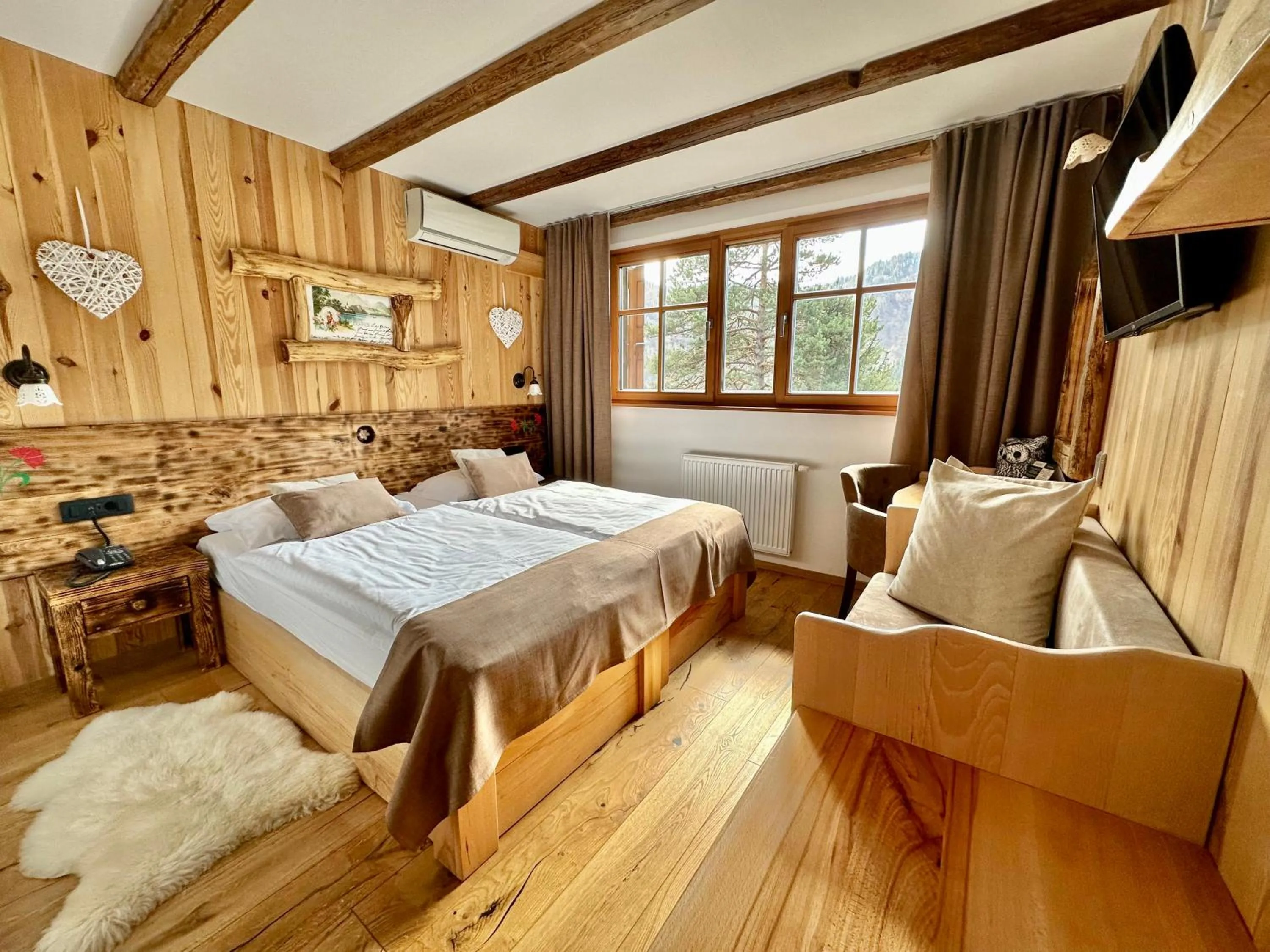 Bed in Ribno Alpine Hotel
