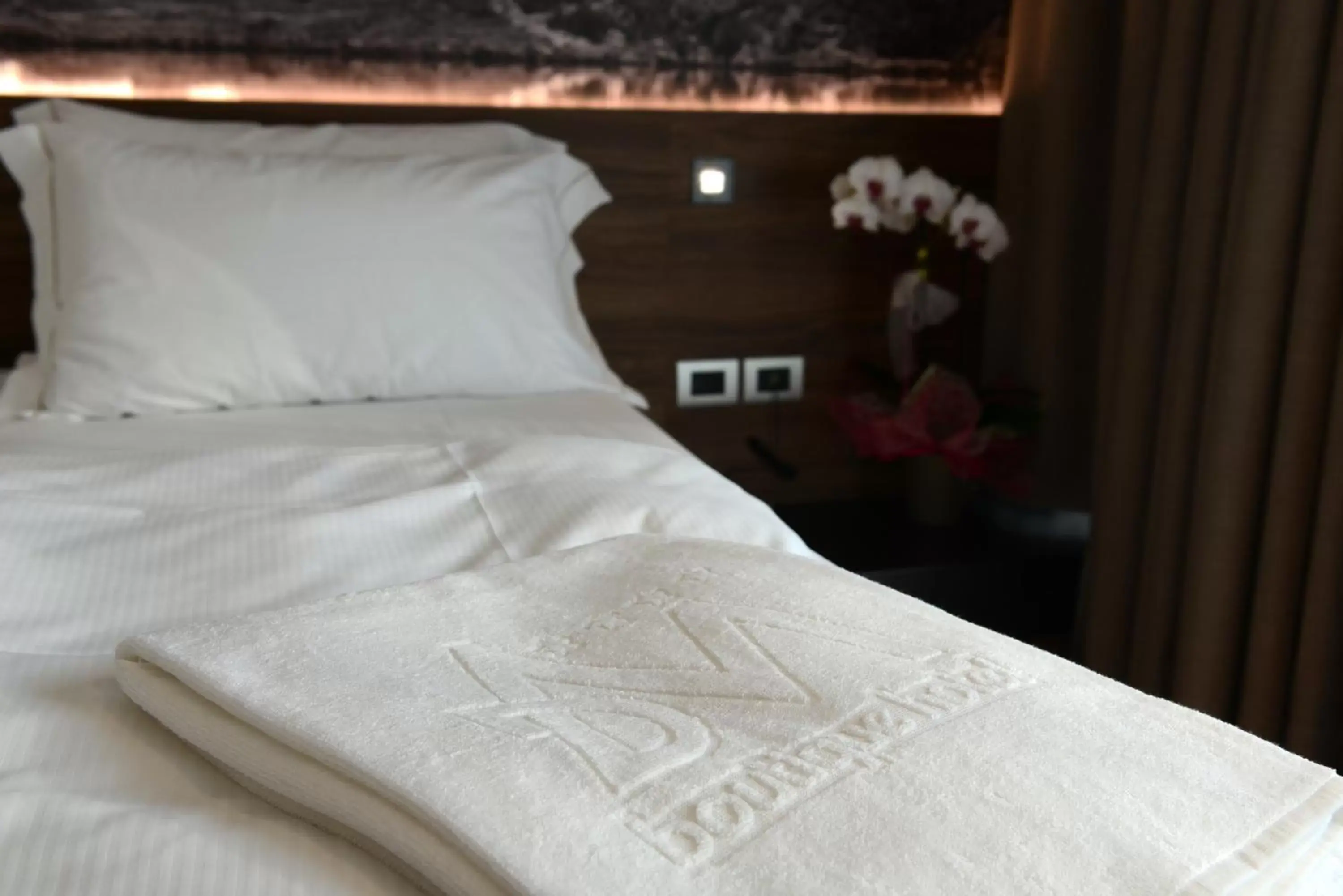 Bed in Dolomeet Boutique Hotel