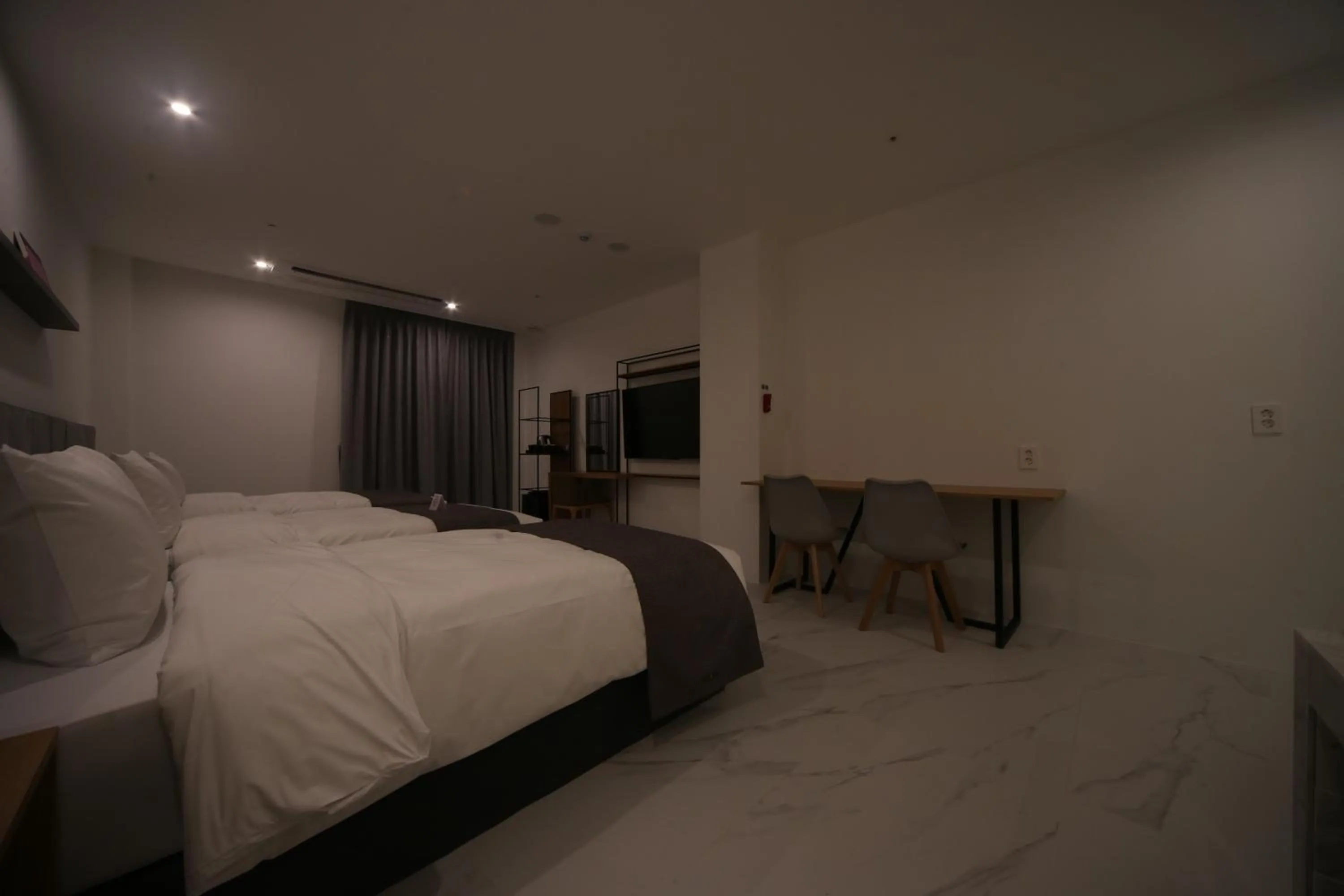 Bed in Hotel Noblestay