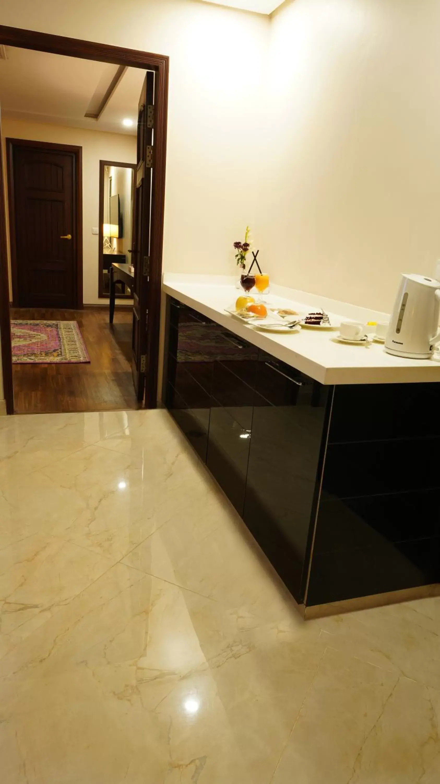 Kitchen or kitchenette, Kitchen/Kitchenette in Ramada by Wyndham Lahore Gulberg II