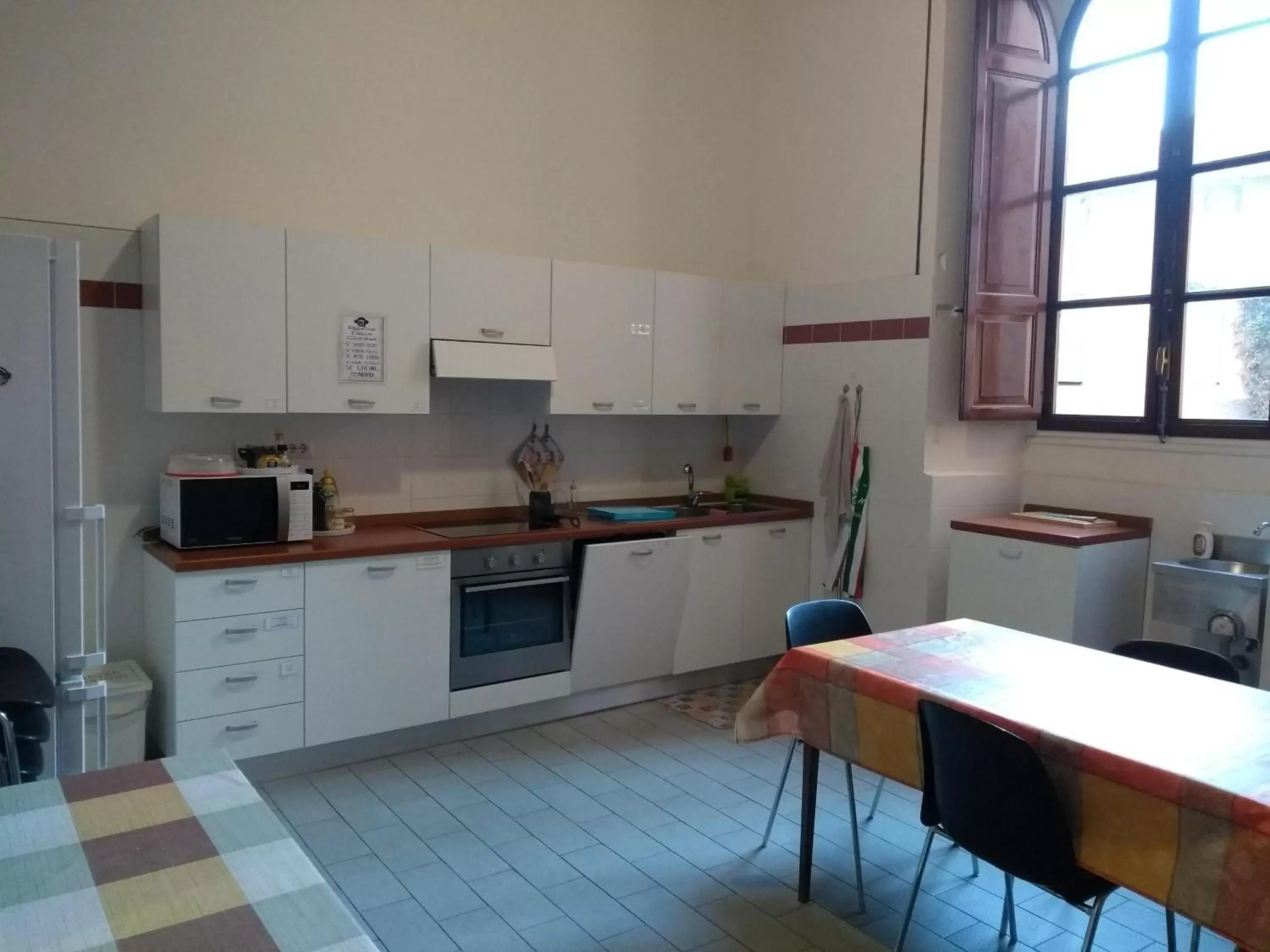 Communal kitchen, Kitchen/Kitchenette in Casa S. Giuseppe di Cluny