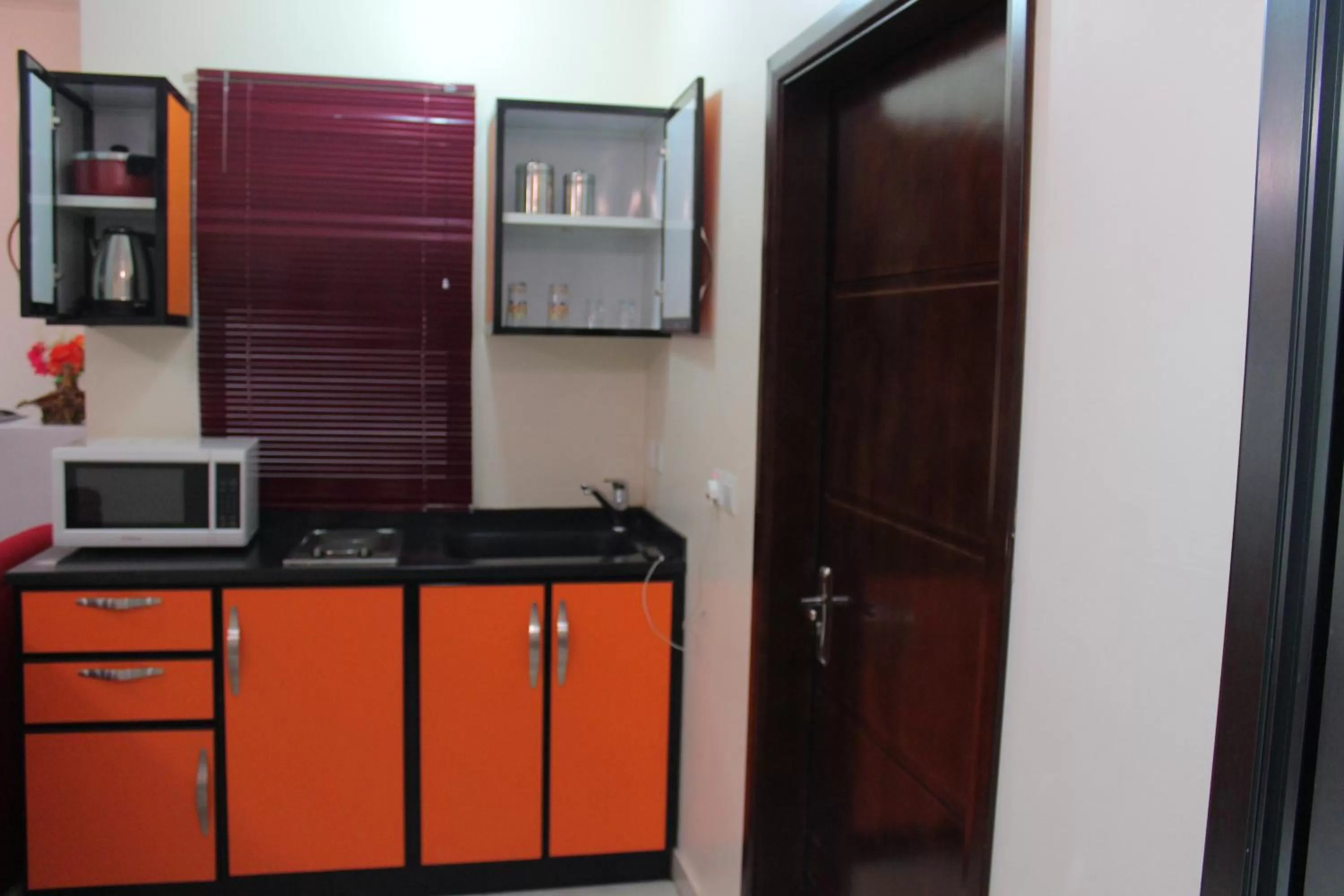 Kitchen/Kitchenette in Al Amoria Apartments