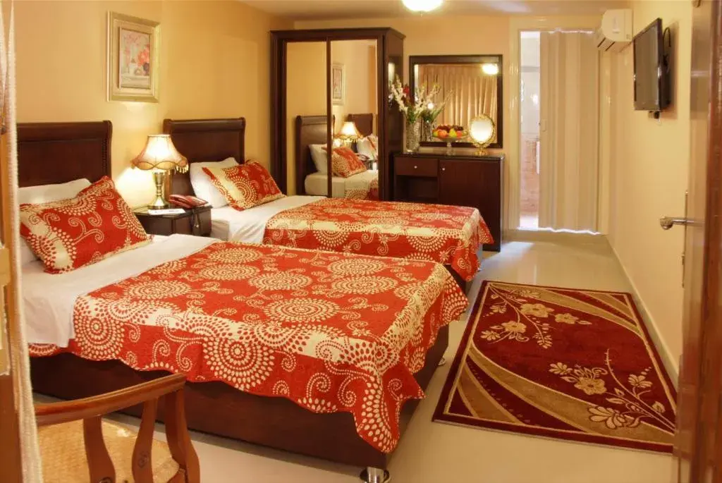 Bed in Jardaneh Hotel