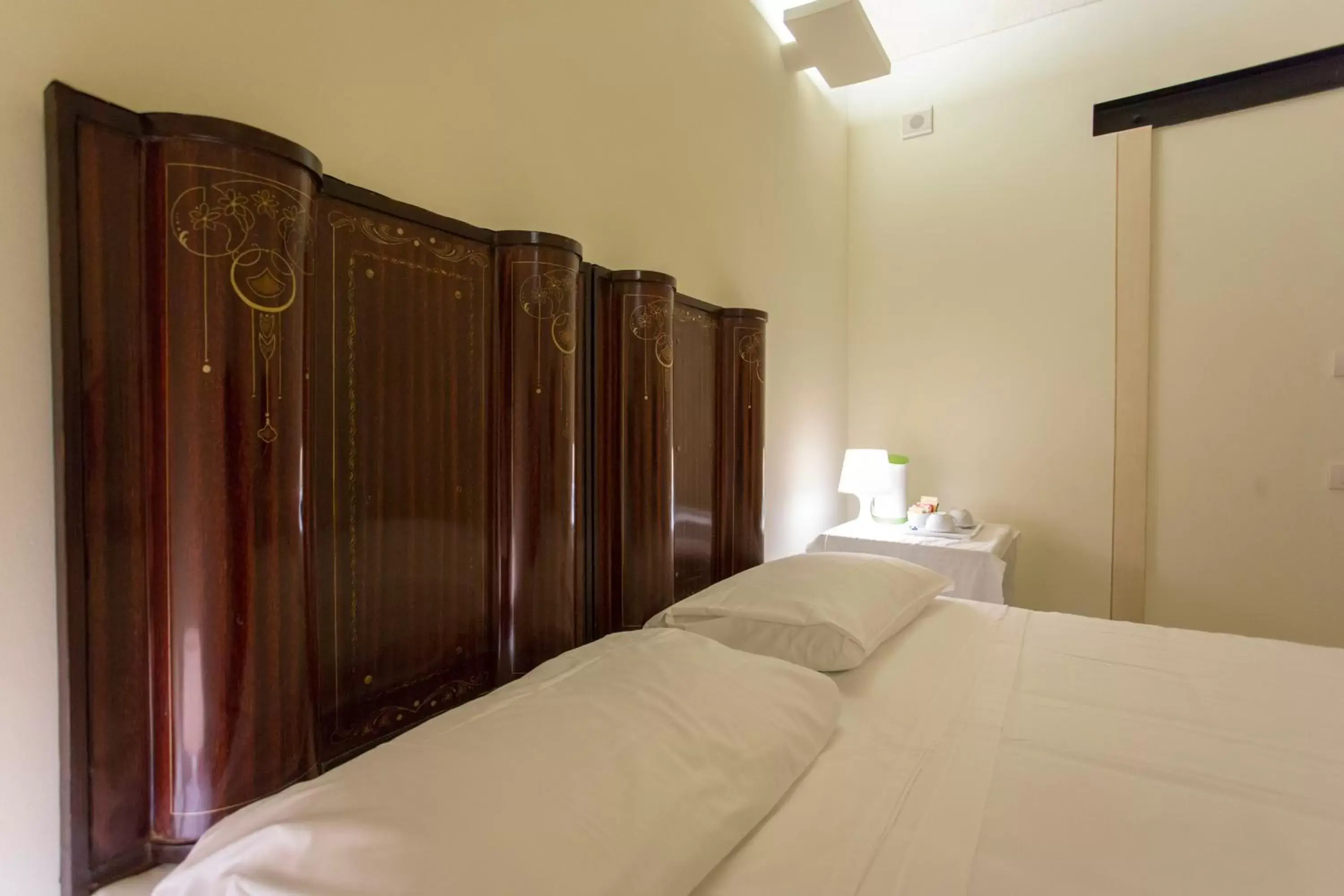 Decorative detail, Bed in Hotel Casino Ridola