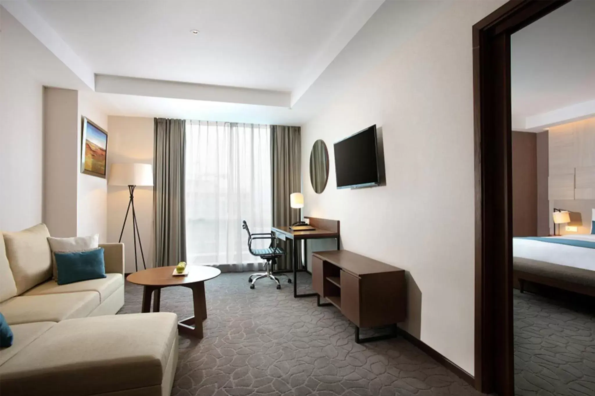 Photo of the whole room, TV/Entertainment Center in Crowne Plaza Bandung, an IHG Hotel