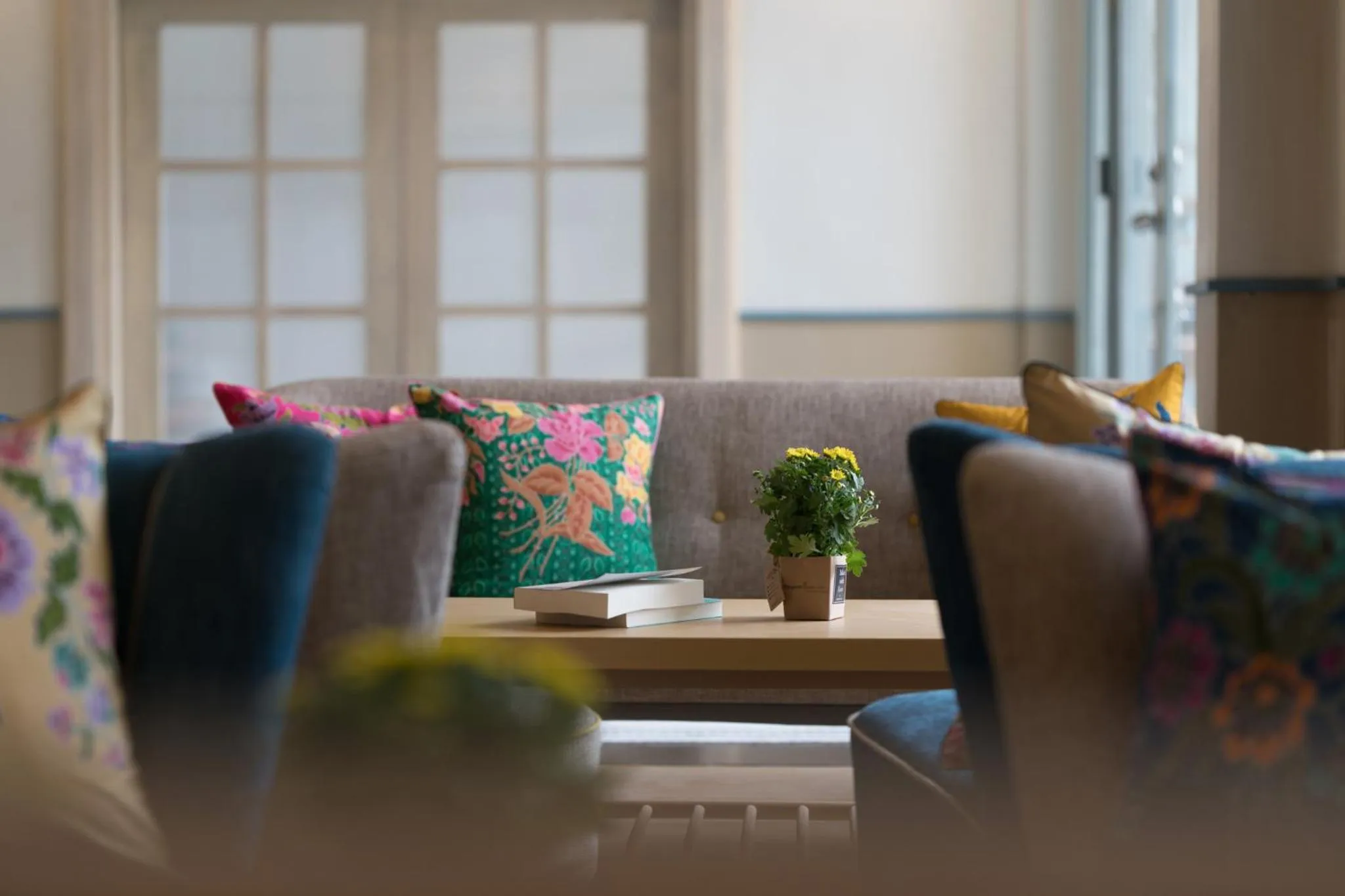 Communal lounge/ TV room in The Blanket Hotel Phuket Old Town