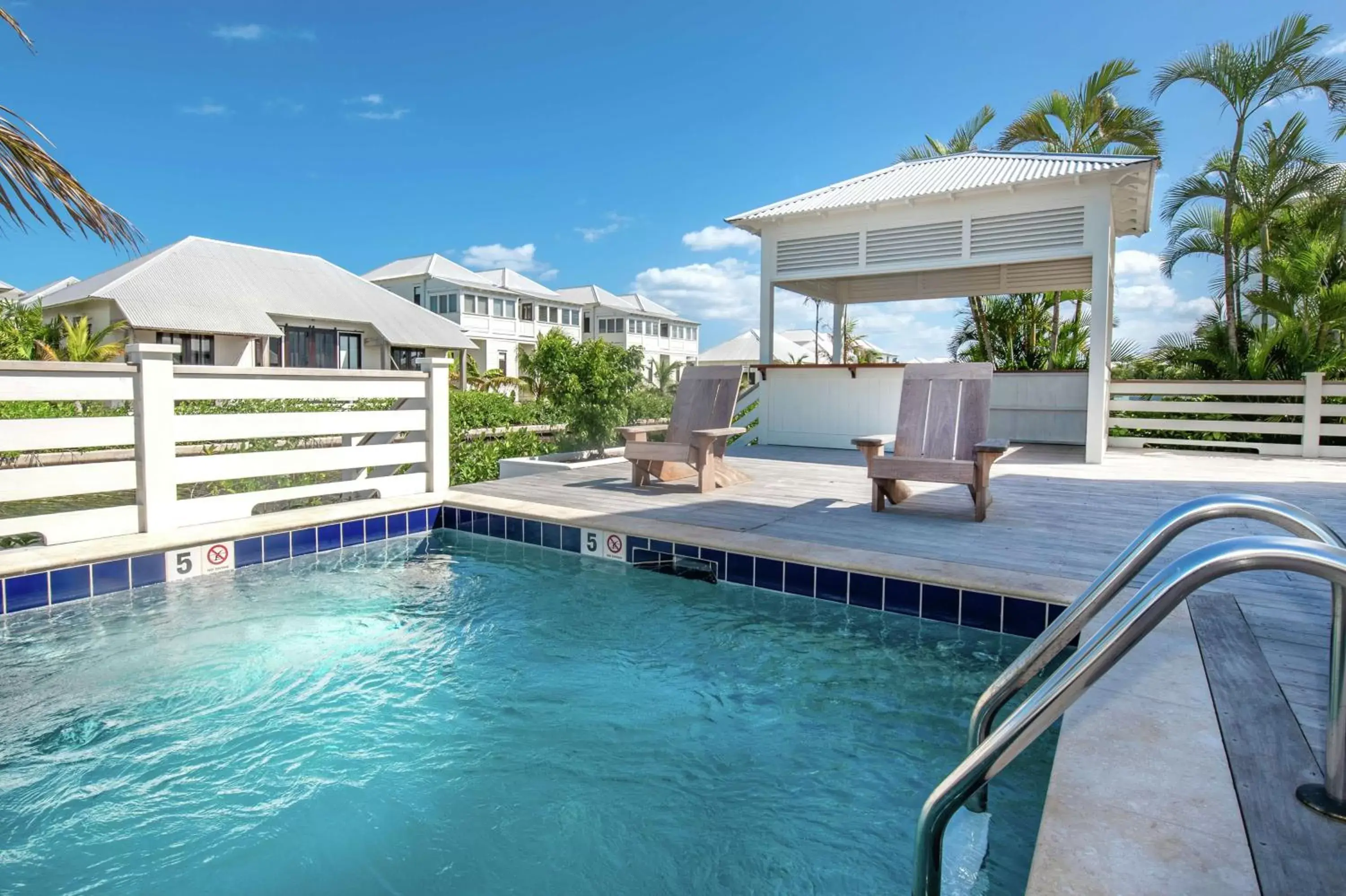 Living room, Swimming Pool in Mahogany Bay Resort and Beach Club, Curio Collection