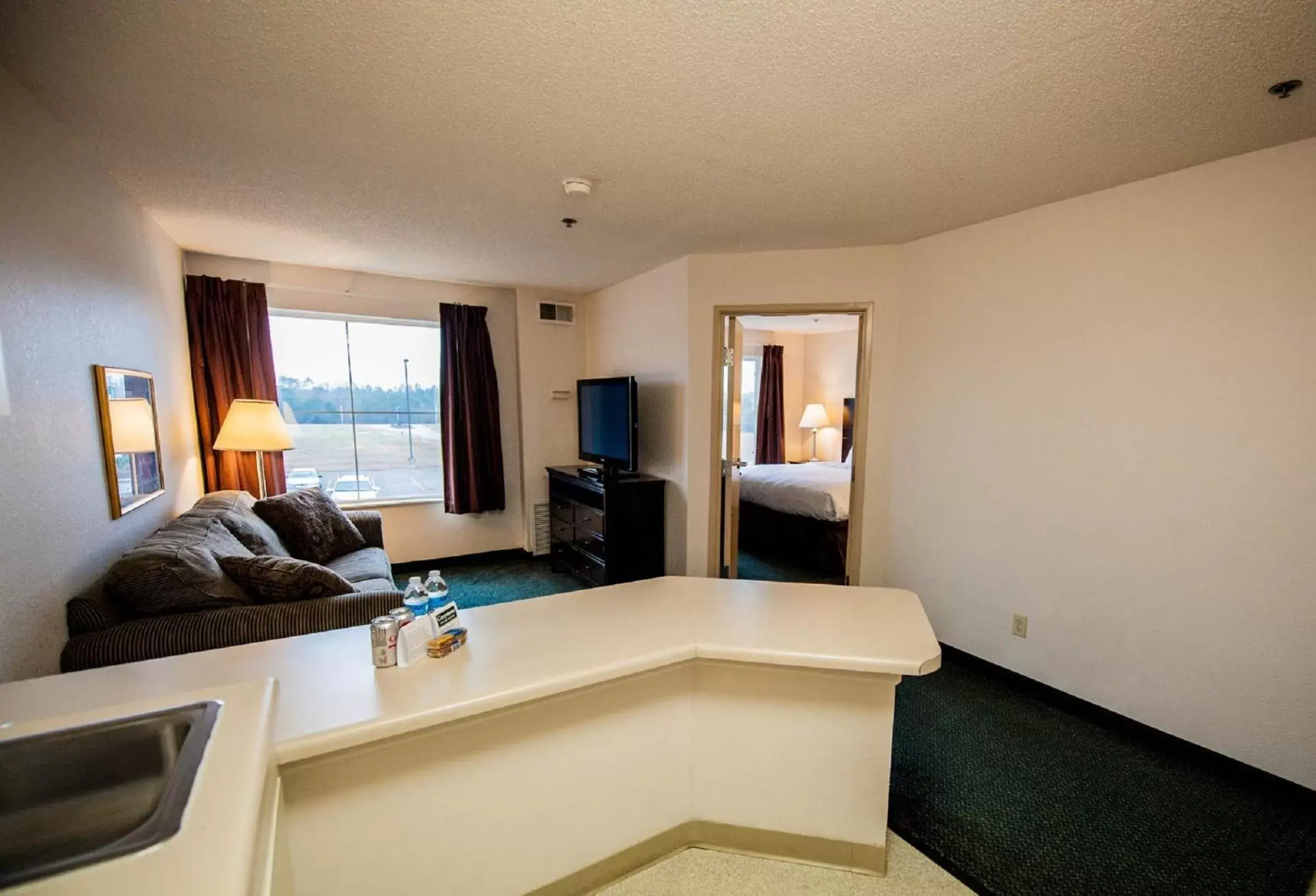 Living room, Seating Area in Greystone Inn & Suites