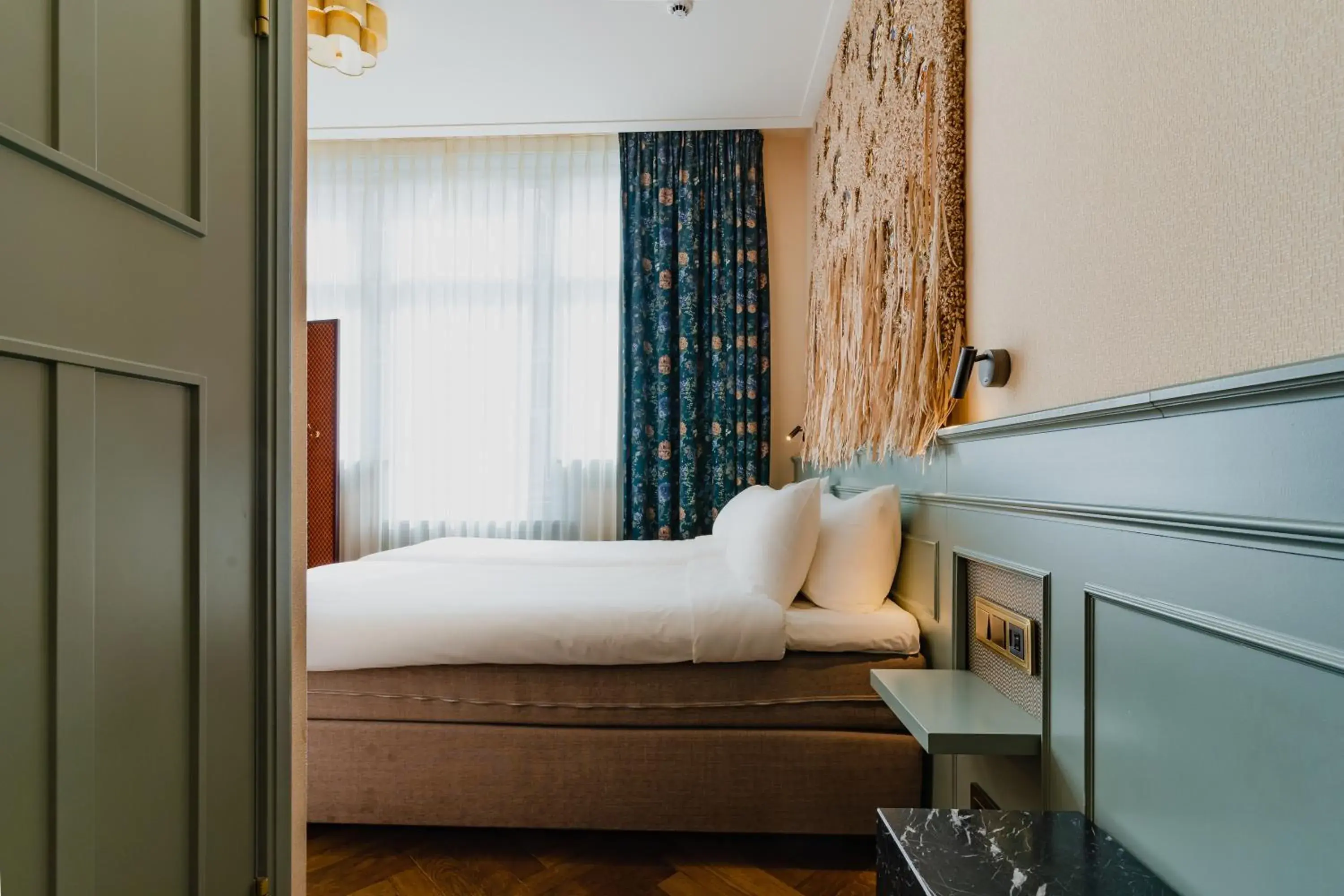 Bed in Hotel Mercier