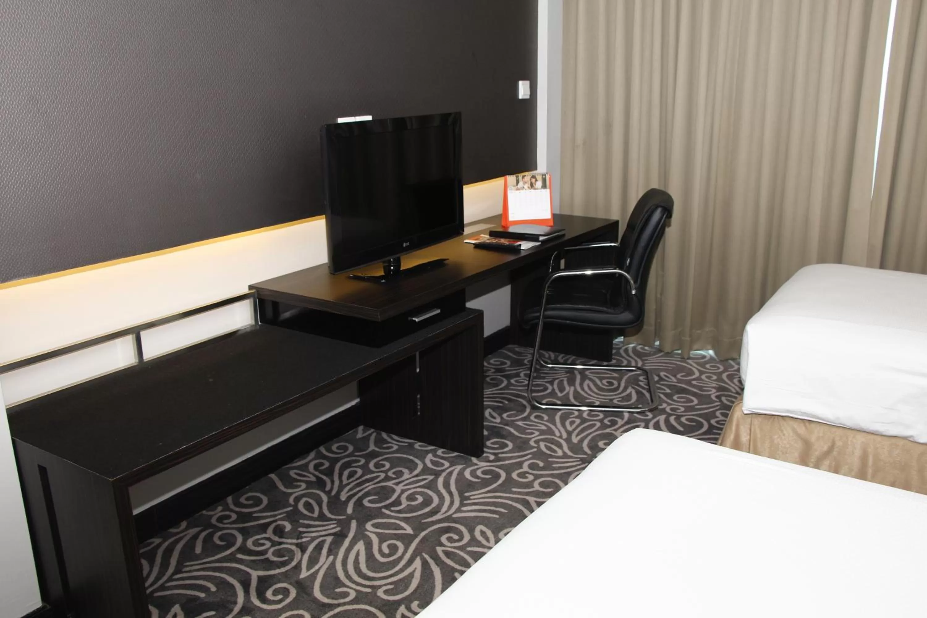 TV and multimedia, Bed in Swiss-Belhotel Balikpapan