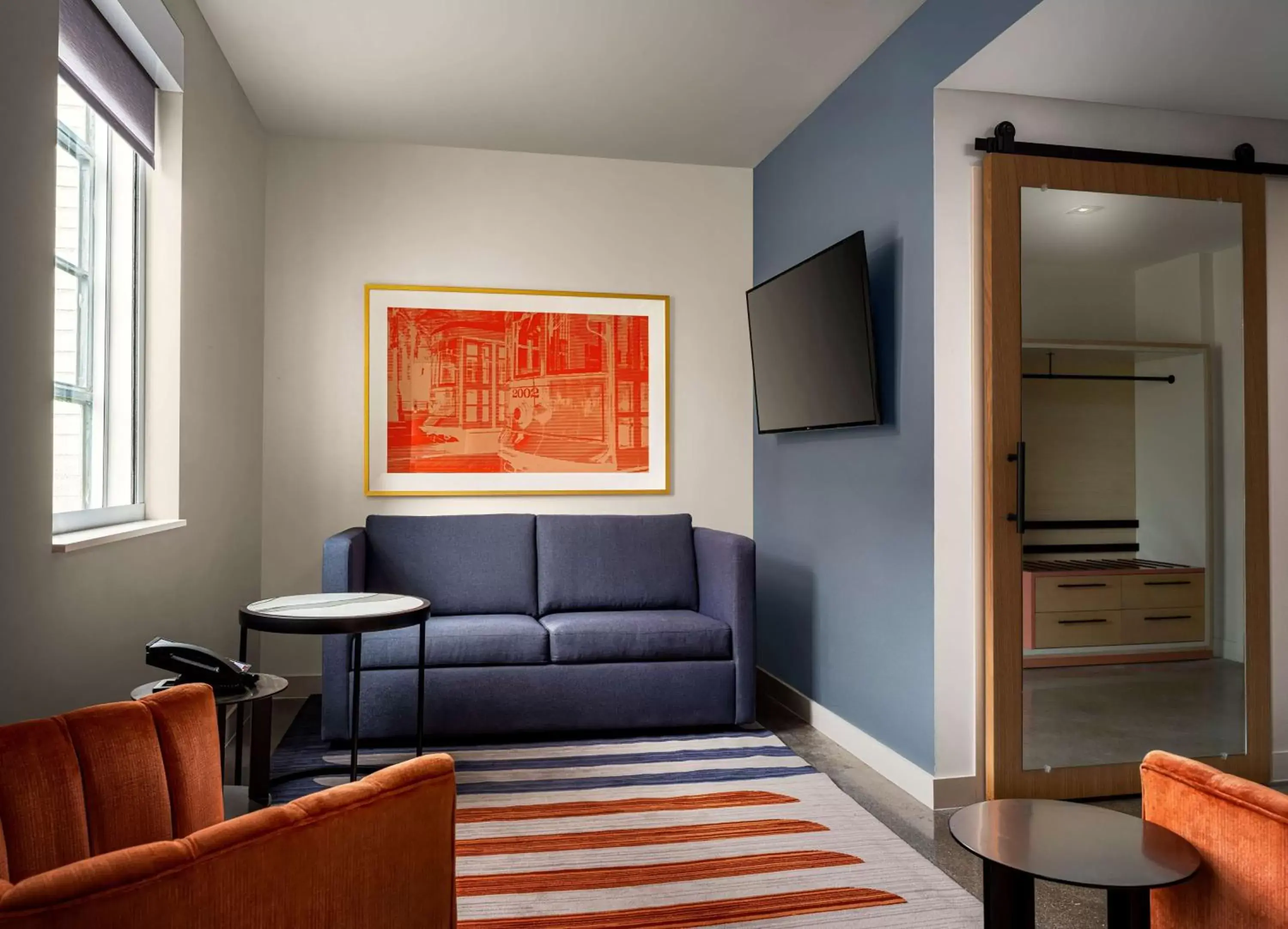 Living room in Canopy by Hilton New Orleans Downtown Living room in Canopy by Hilton New Orleans Downtown