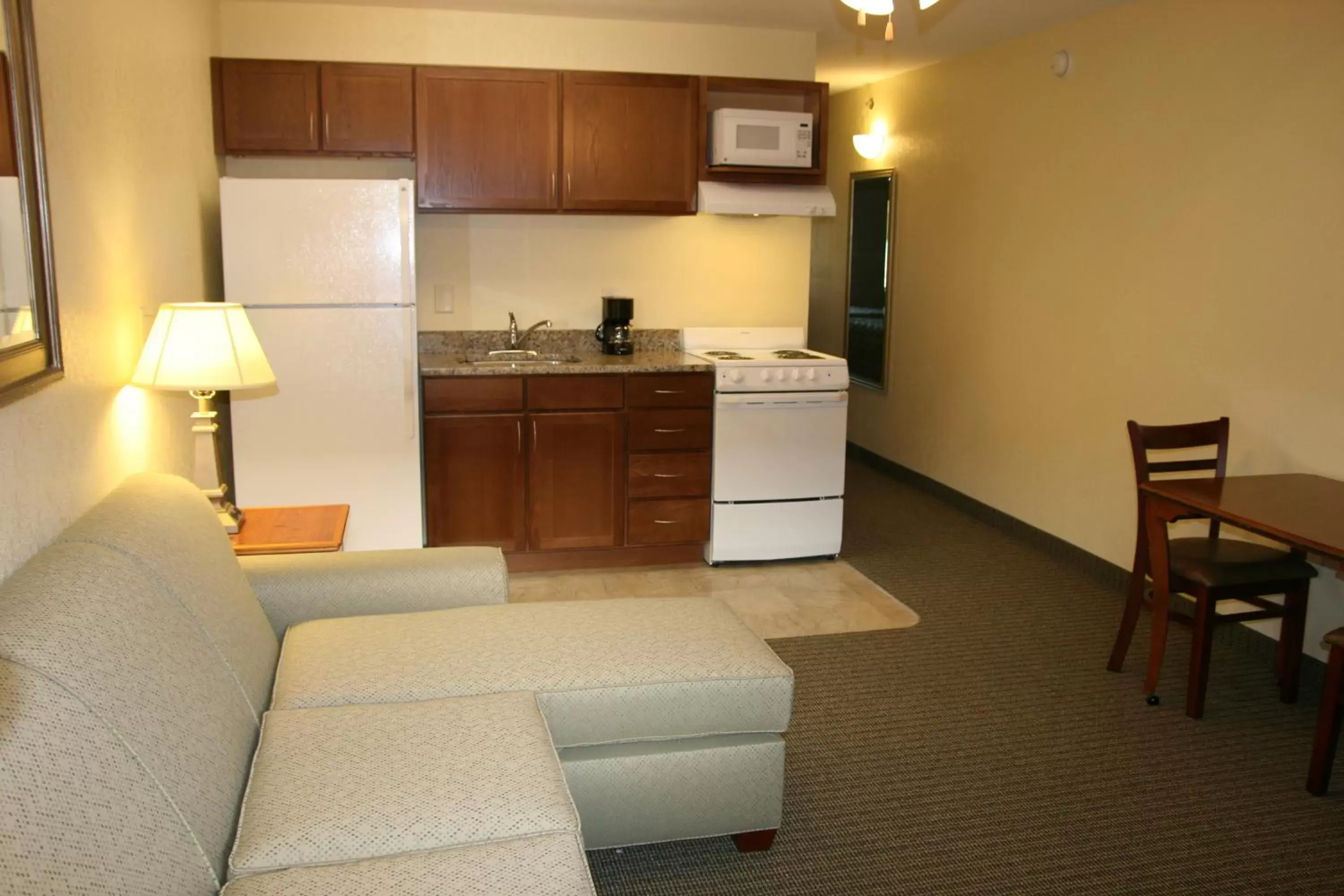 Photo of the whole room, Kitchen/Kitchenette in Affordable Suites of America Augusta