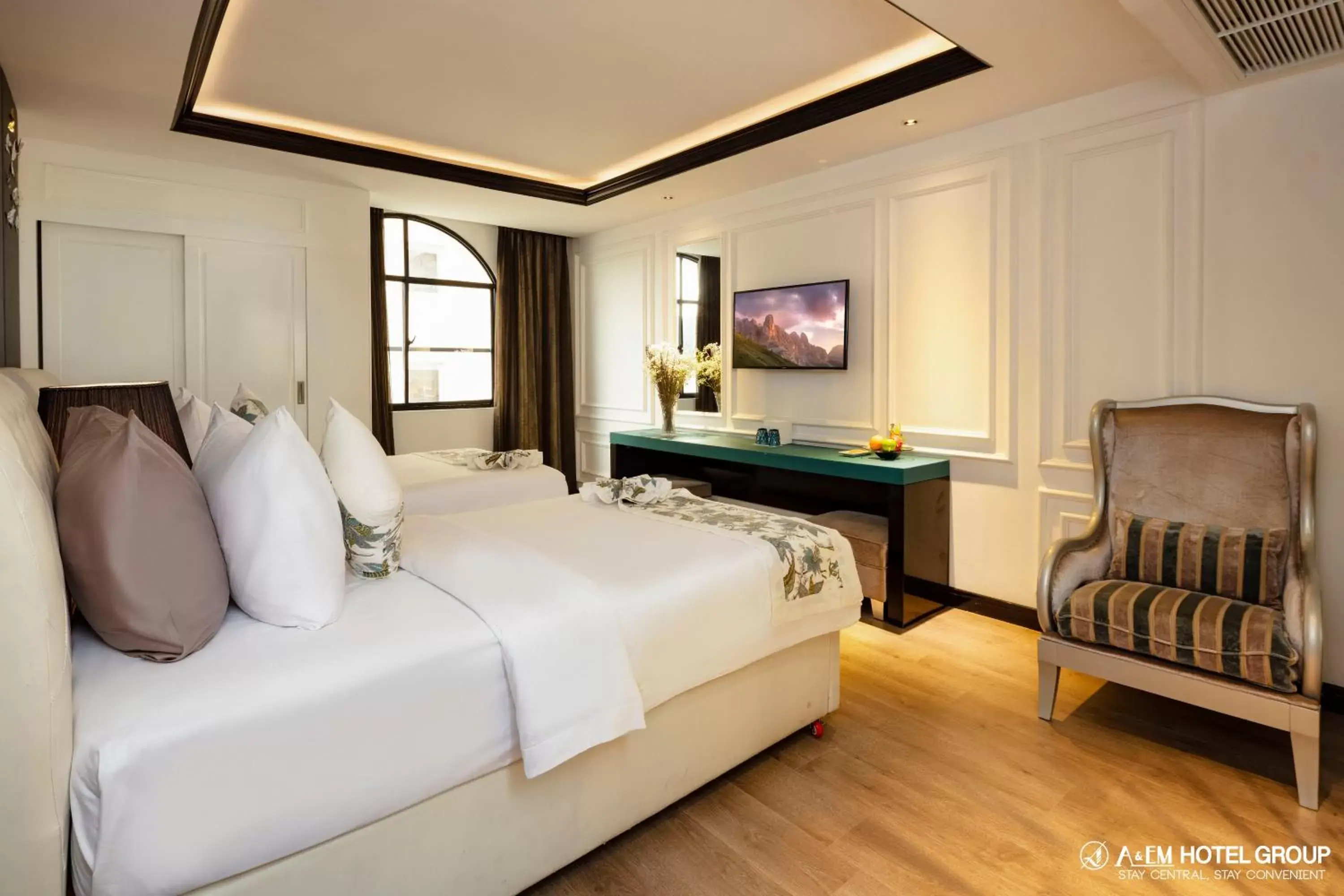 Bed in A&EM Saigon Hotel Bed in A&EM Saigon Hotel