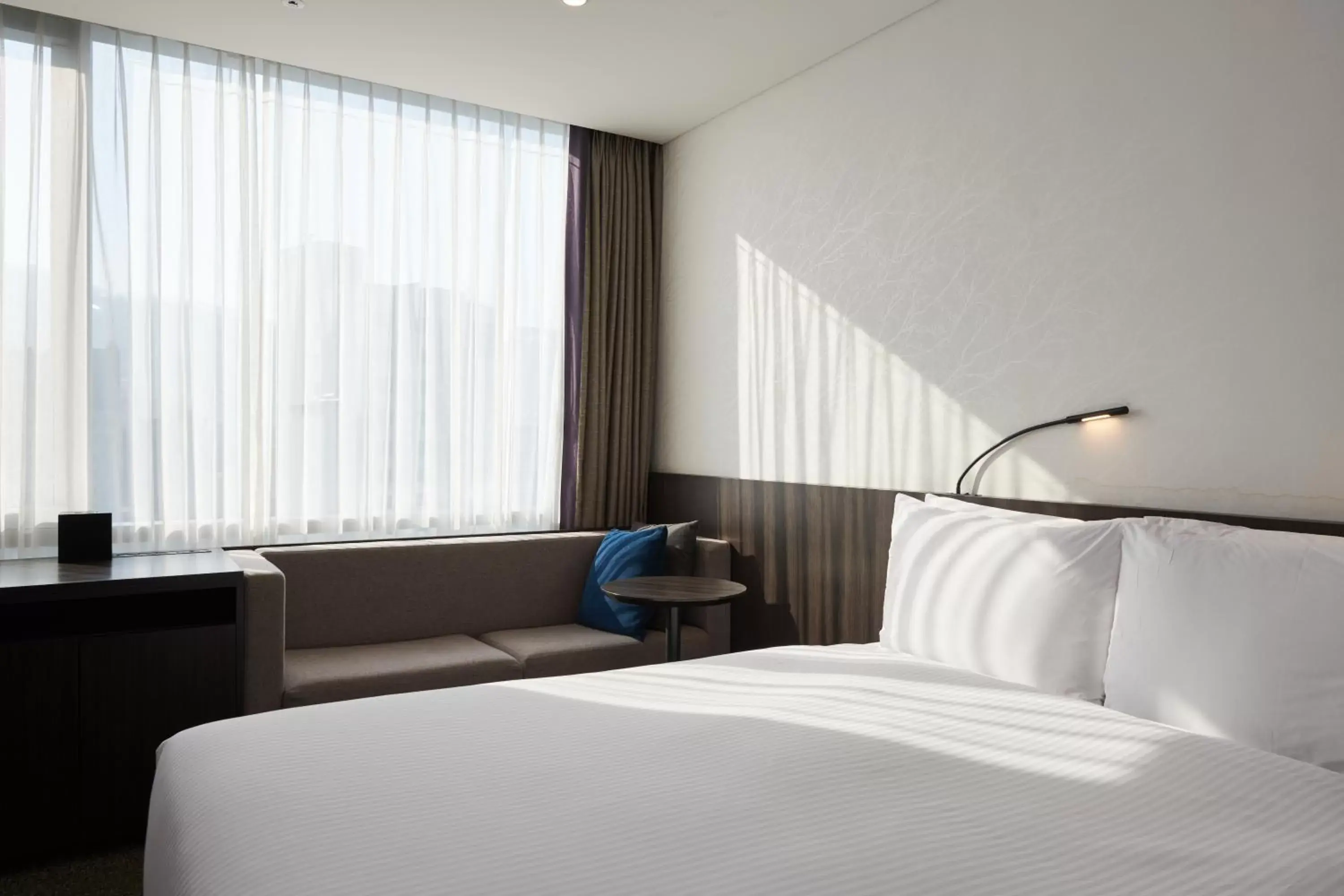 Bed in Nine Tree Premier Hotel Myeongdong 2