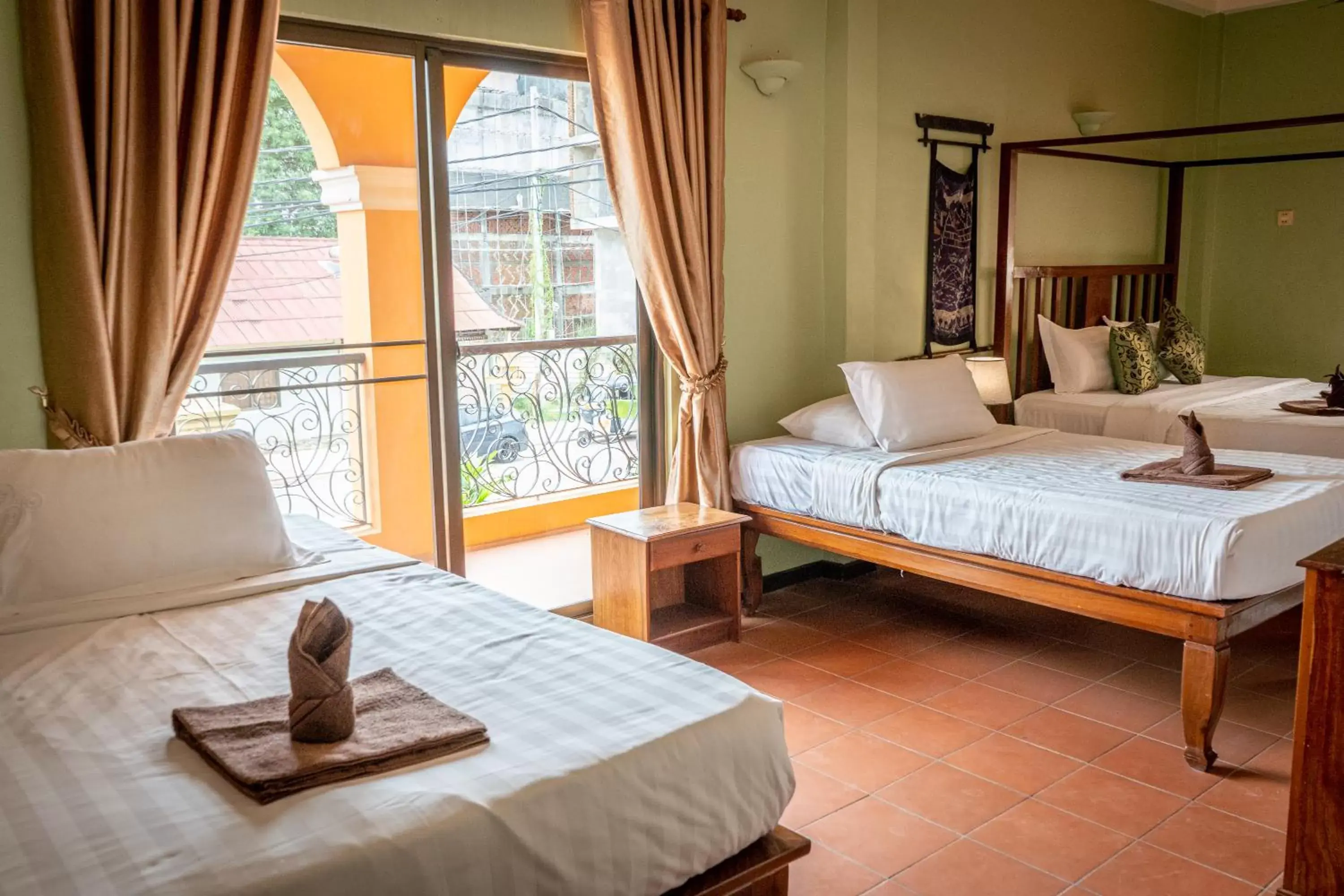Triple Room with Balcony in DEN HOTEL TOTONOU SIEM REAP Triple Room with Balcony in DEN HOTEL TOTONOU SIEM REAP