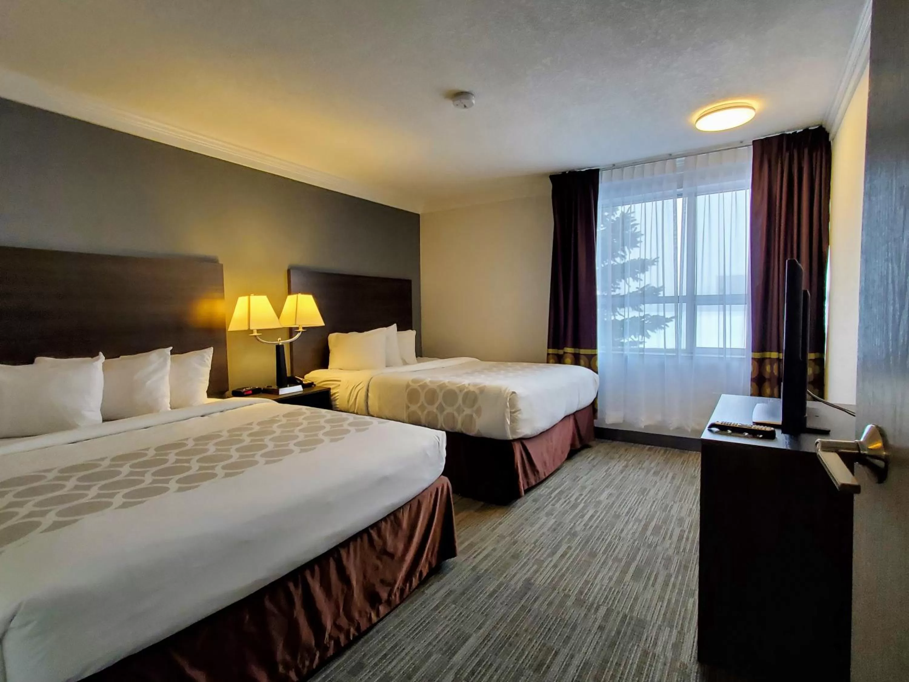 Studio Suite with Two Queen Beds - Non-Smoking in Super 8 by Wyndham Macleod Trail Calgary