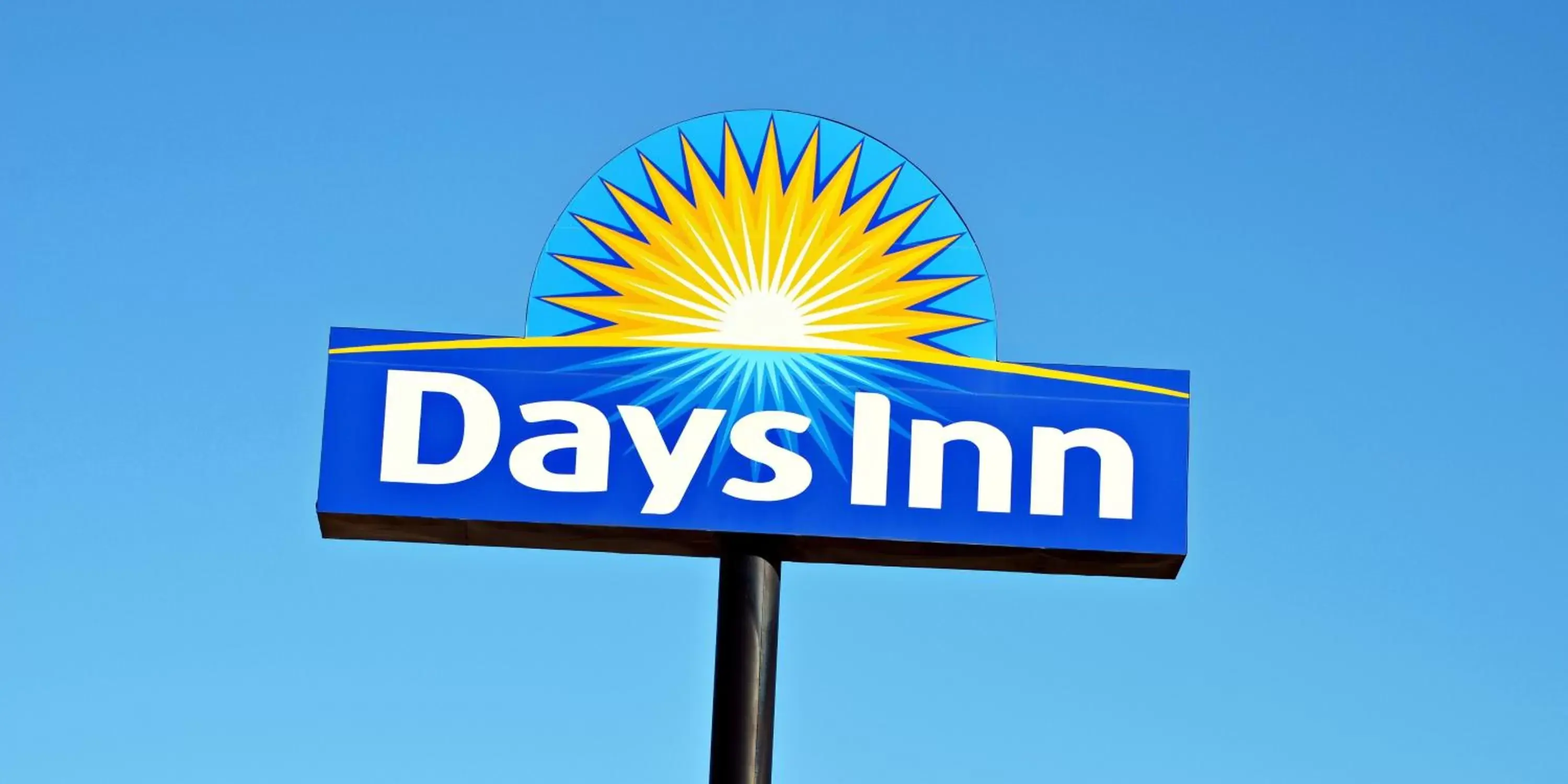 Property logo or sign in Days Inn by Wyndham McAllen