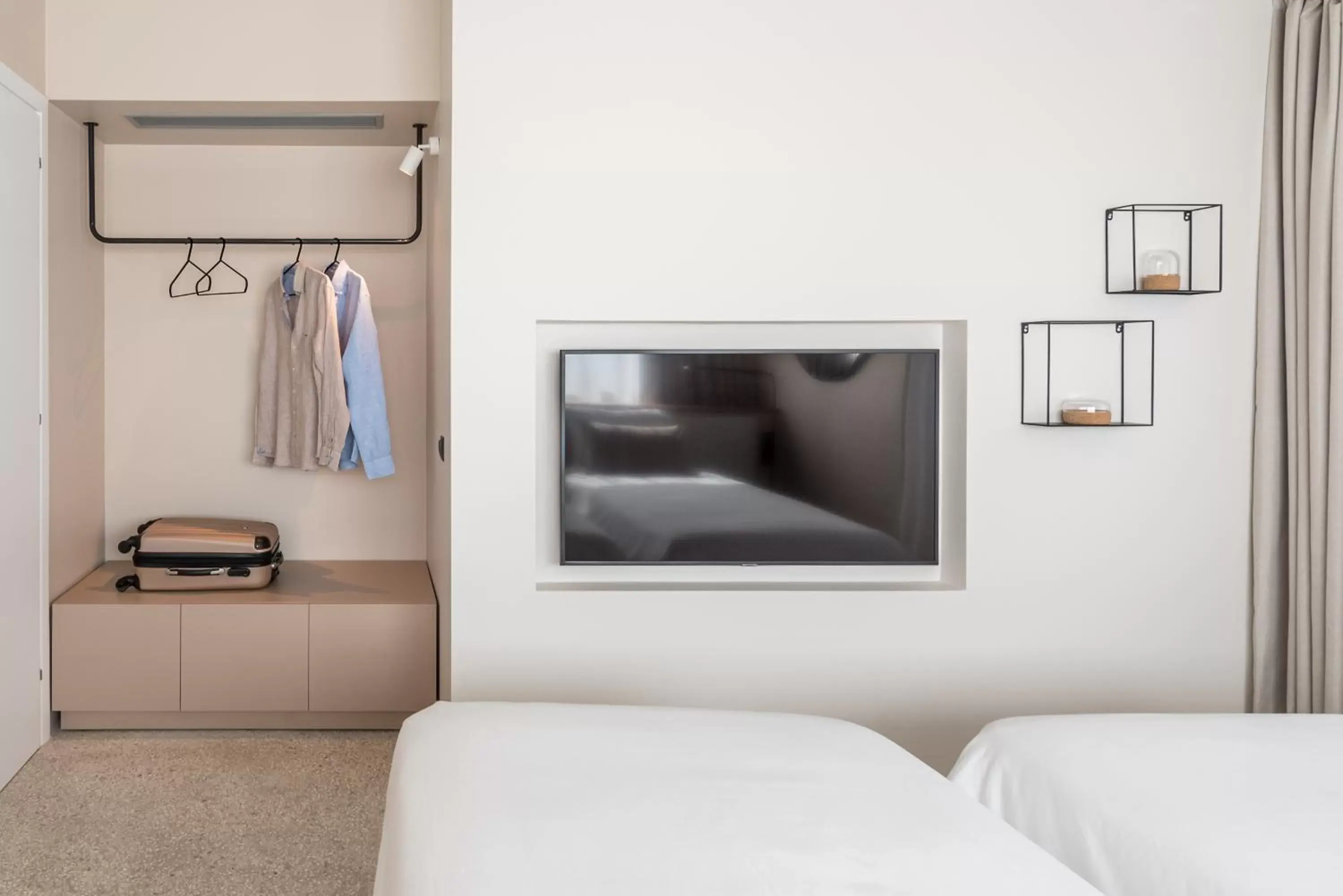 Bedroom, TV/Entertainment Center in Urban Suites