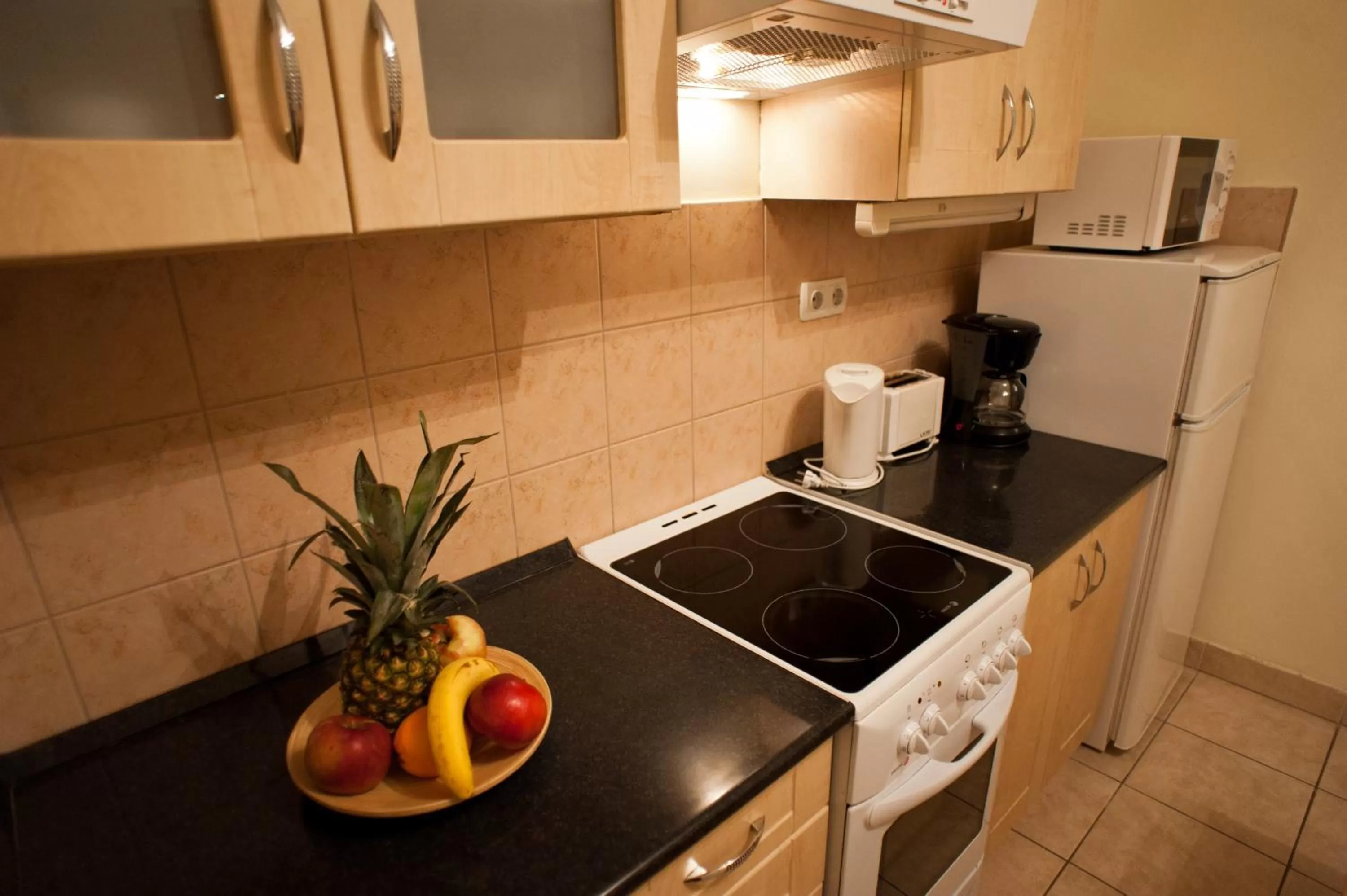 Kitchen or kitchenette in Agape Apartments