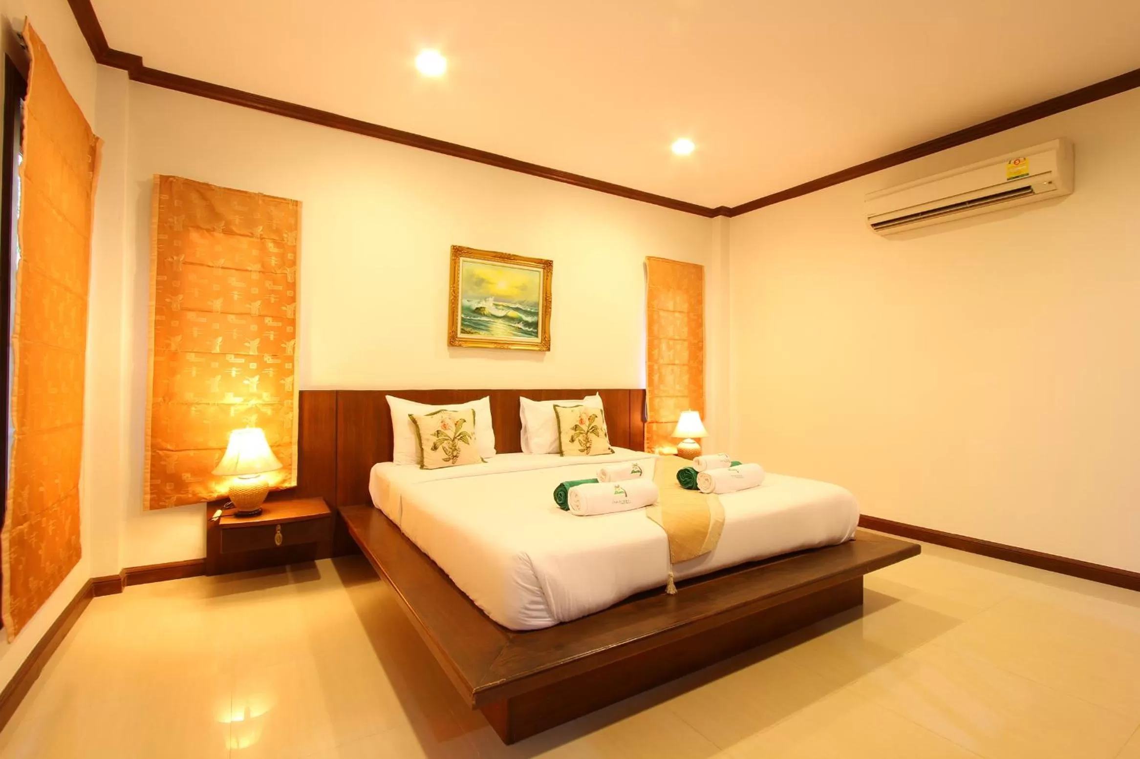 Bed in The Green Beach Resort
