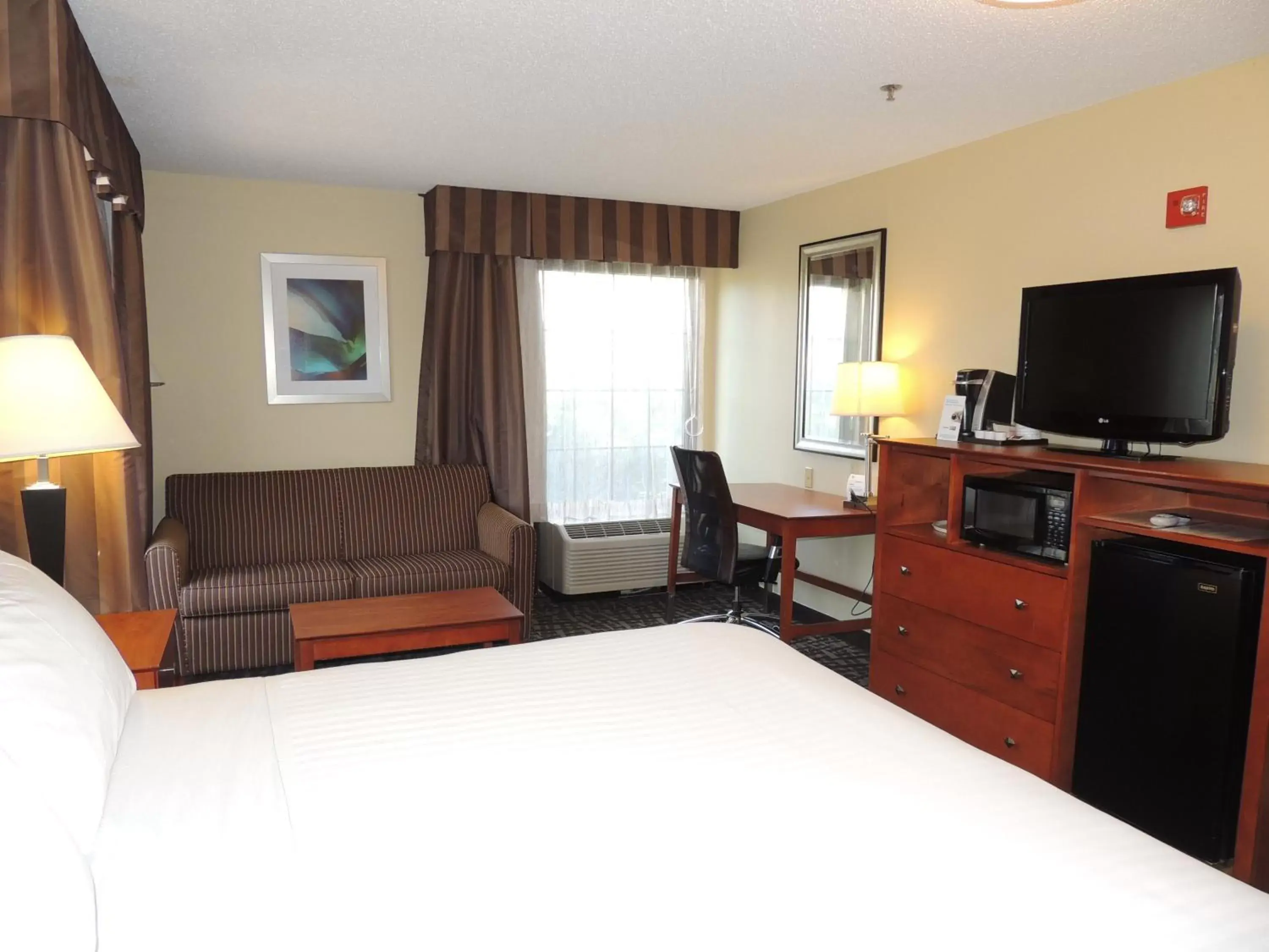 Photo of the whole room, TV/Entertainment Center in Holiday Inn Express Trussville, an IHG Hotel