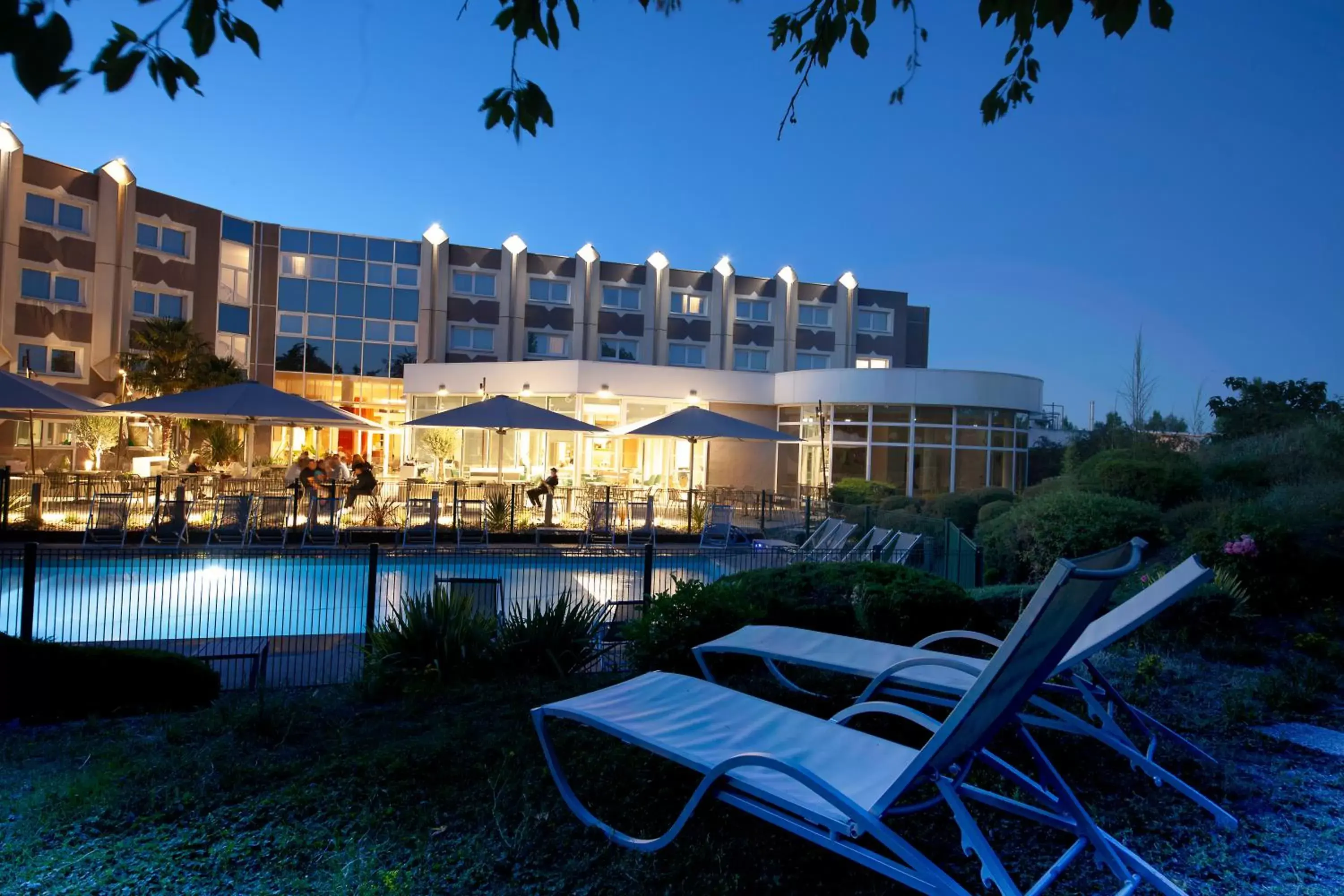 Pool view, Property Building in Novotel Clermont-Ferrand