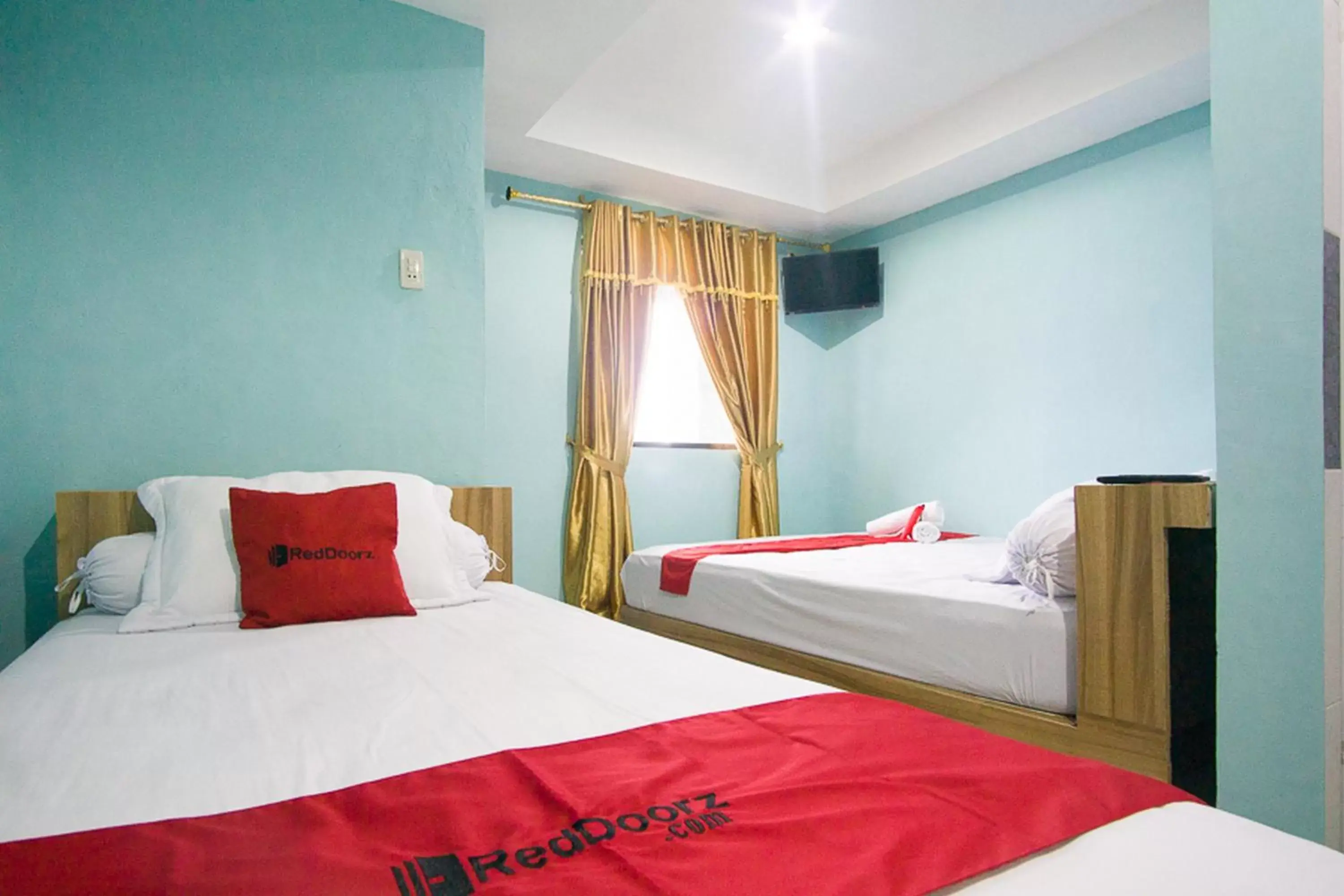 Bed in RedDoorz near Mikie Holiday Funland Berastagi