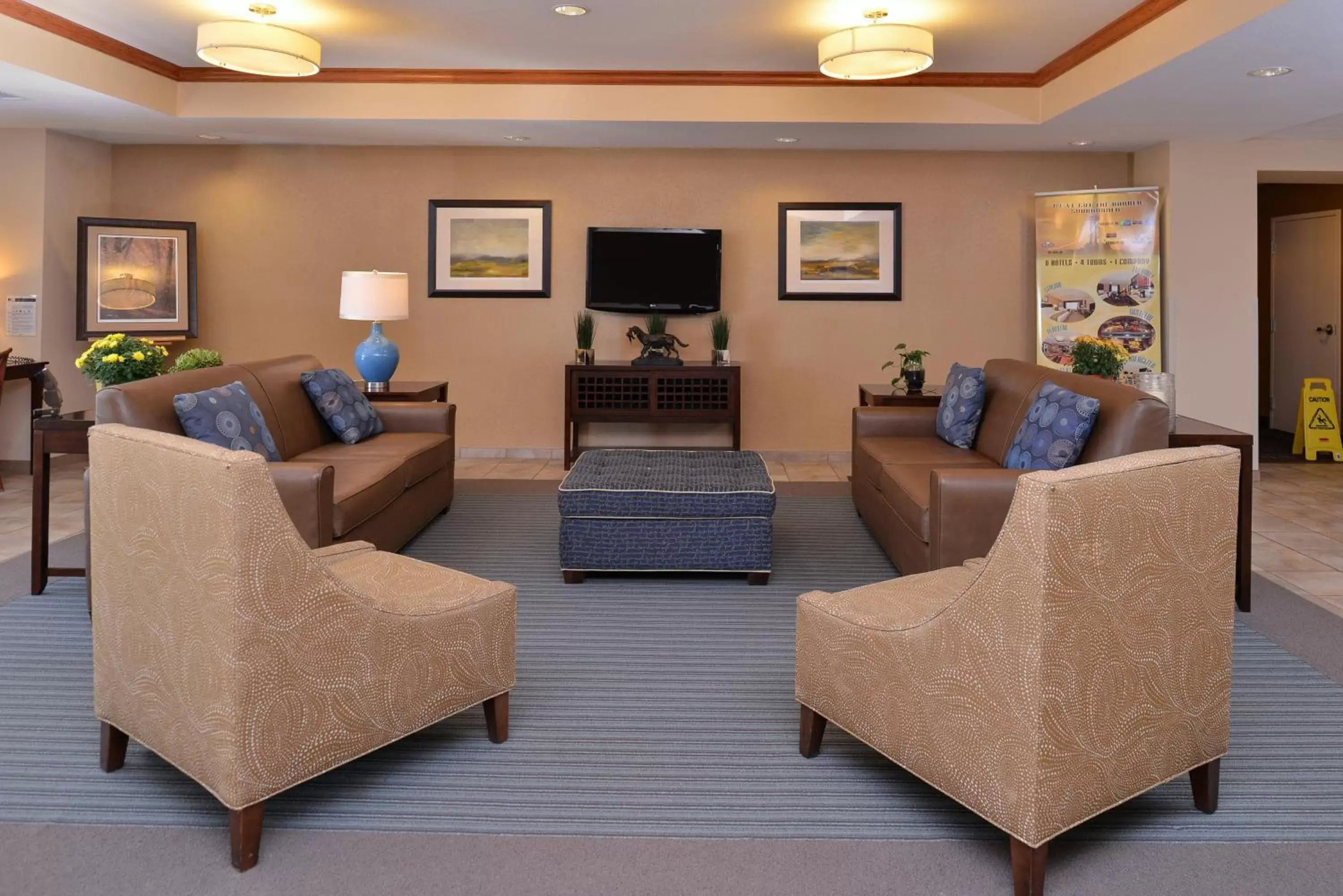 Property building, Seating Area in Candlewood Suites Williston, an IHG Hotel