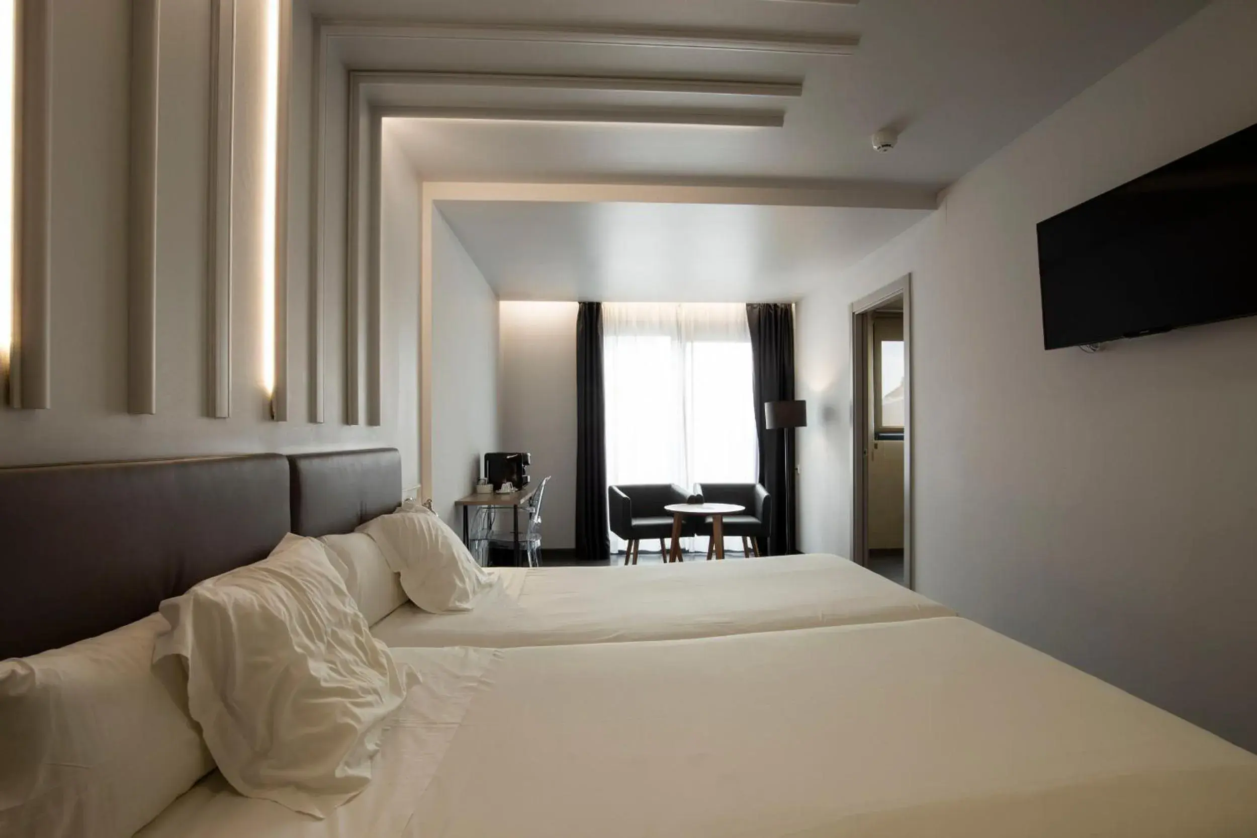 Photo of the whole room, Bed in Hotel Lux Santiago