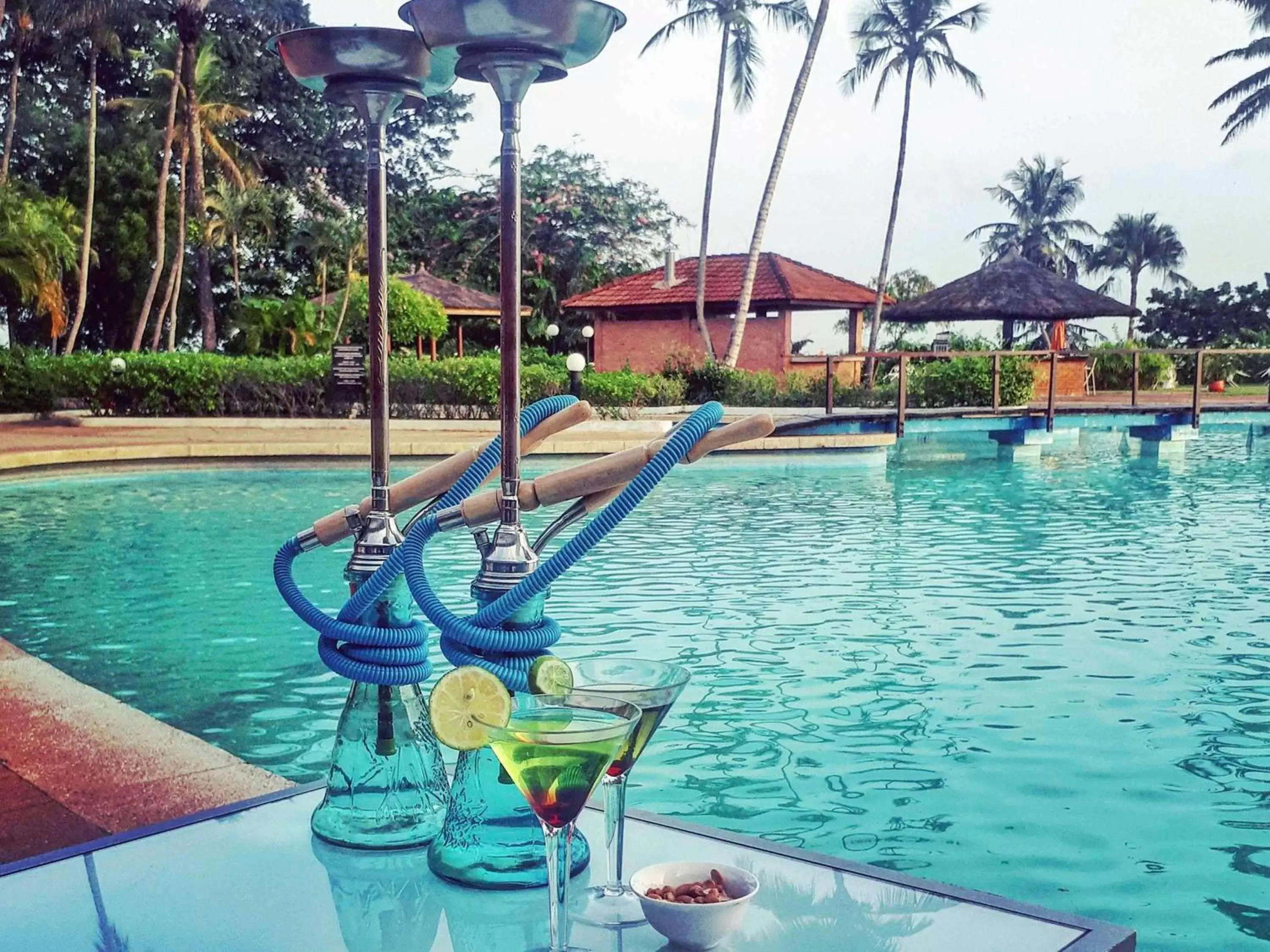 Lounge or bar, Swimming Pool in Sofitel Abidjan Hotel Ivoire