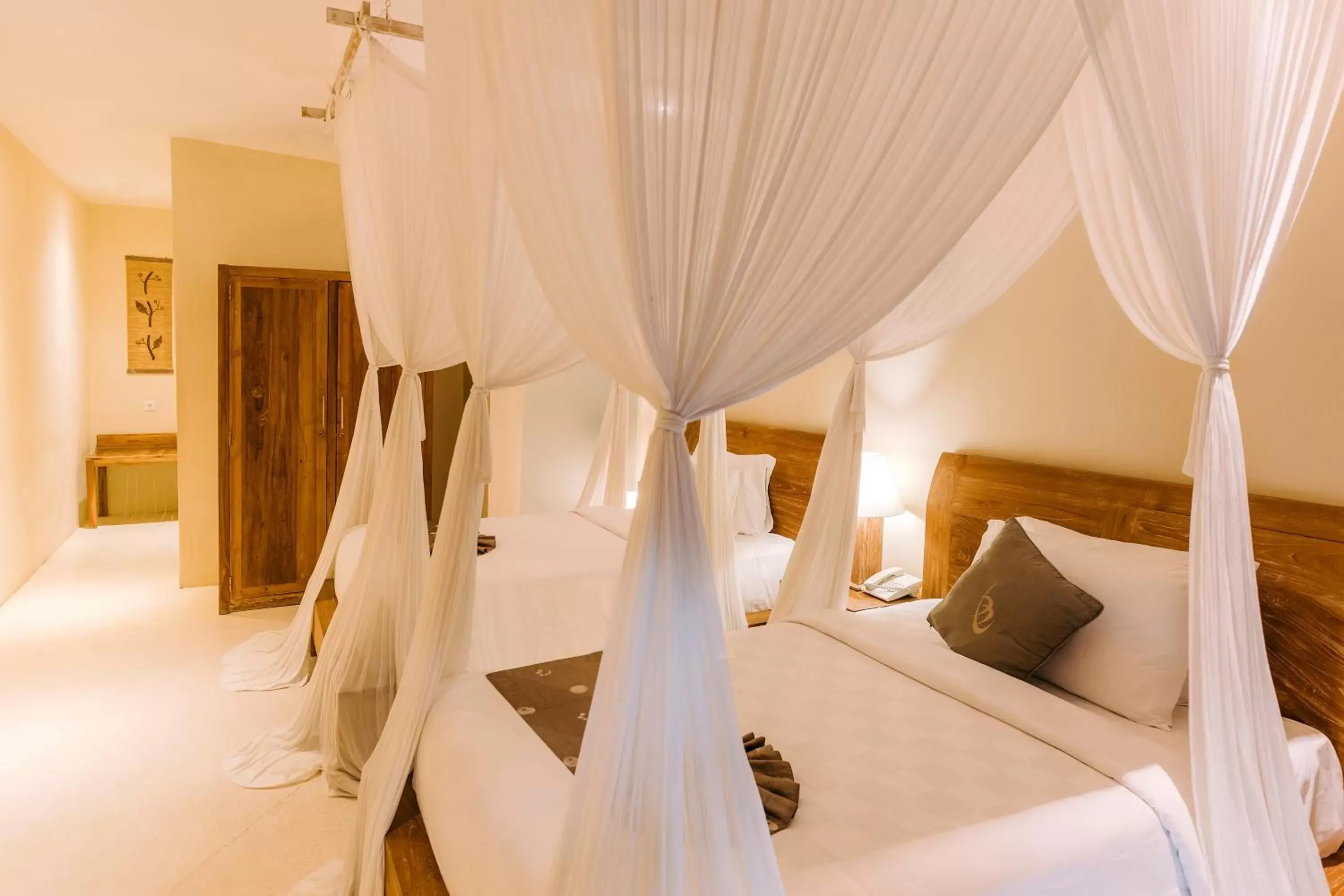 Bedroom, Bed in La Berceuse Resort and Villa Nusa Dua by Taritiya Collection