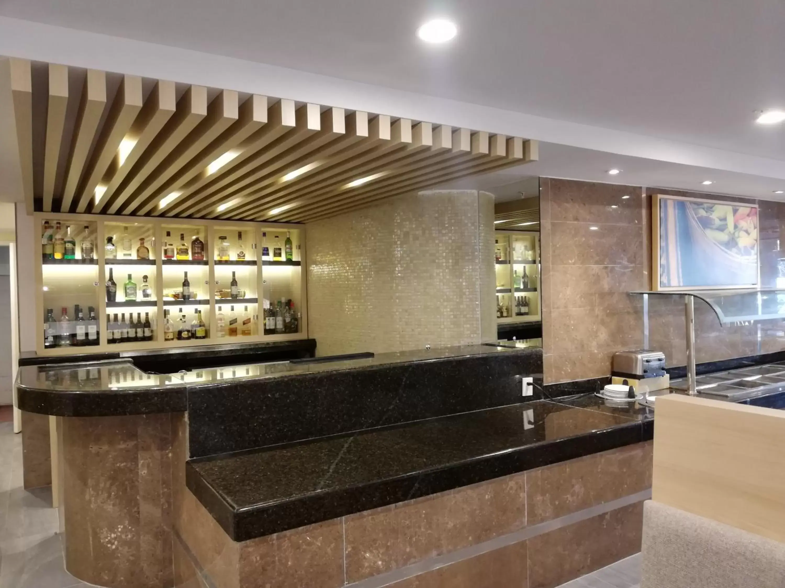 Lounge or bar, Lounge/Bar in Holiday Inn Hotel & Suites Centro Historico, an IHG Hotel