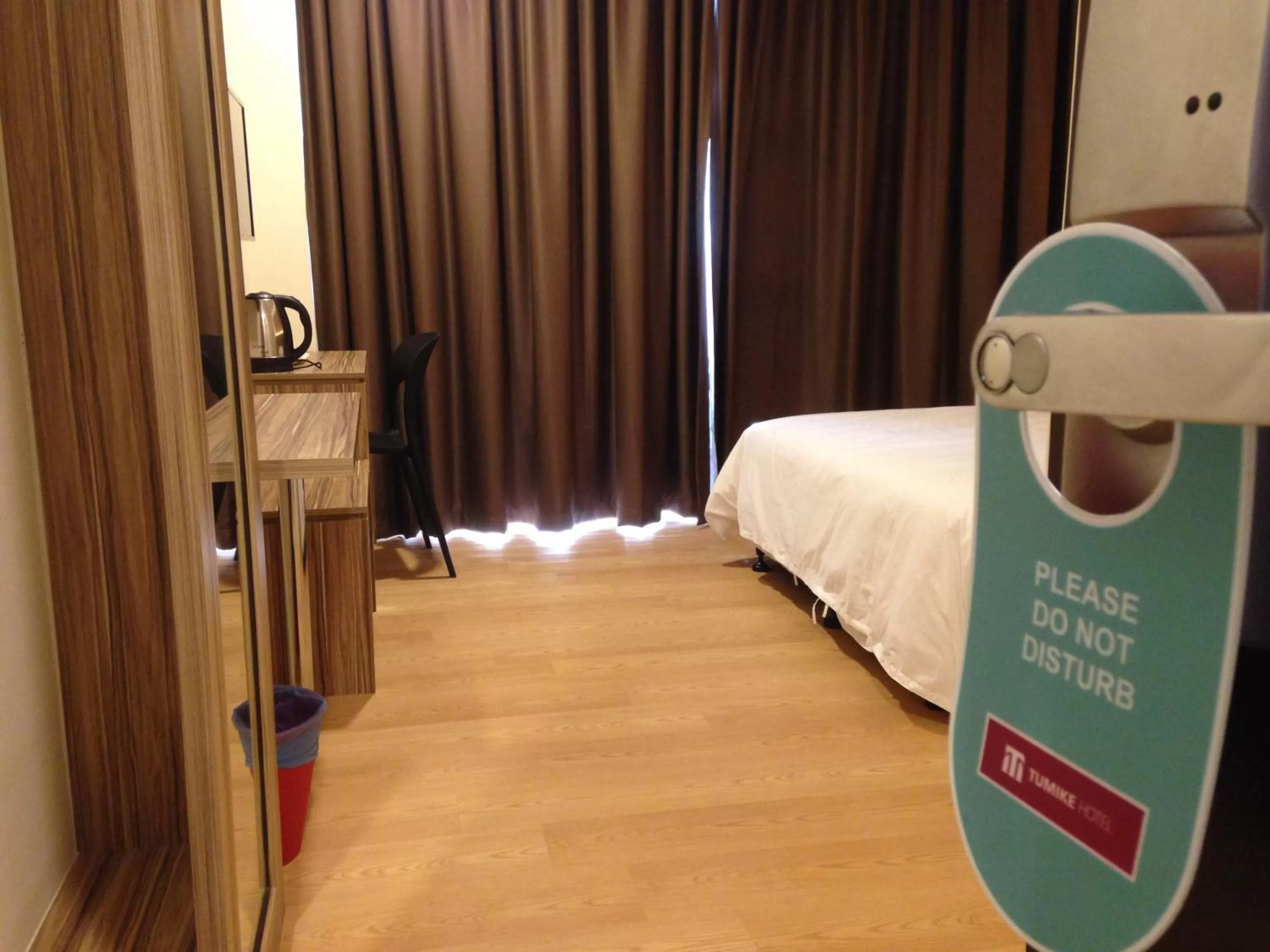 Bed in Tumike Hotel Bentong