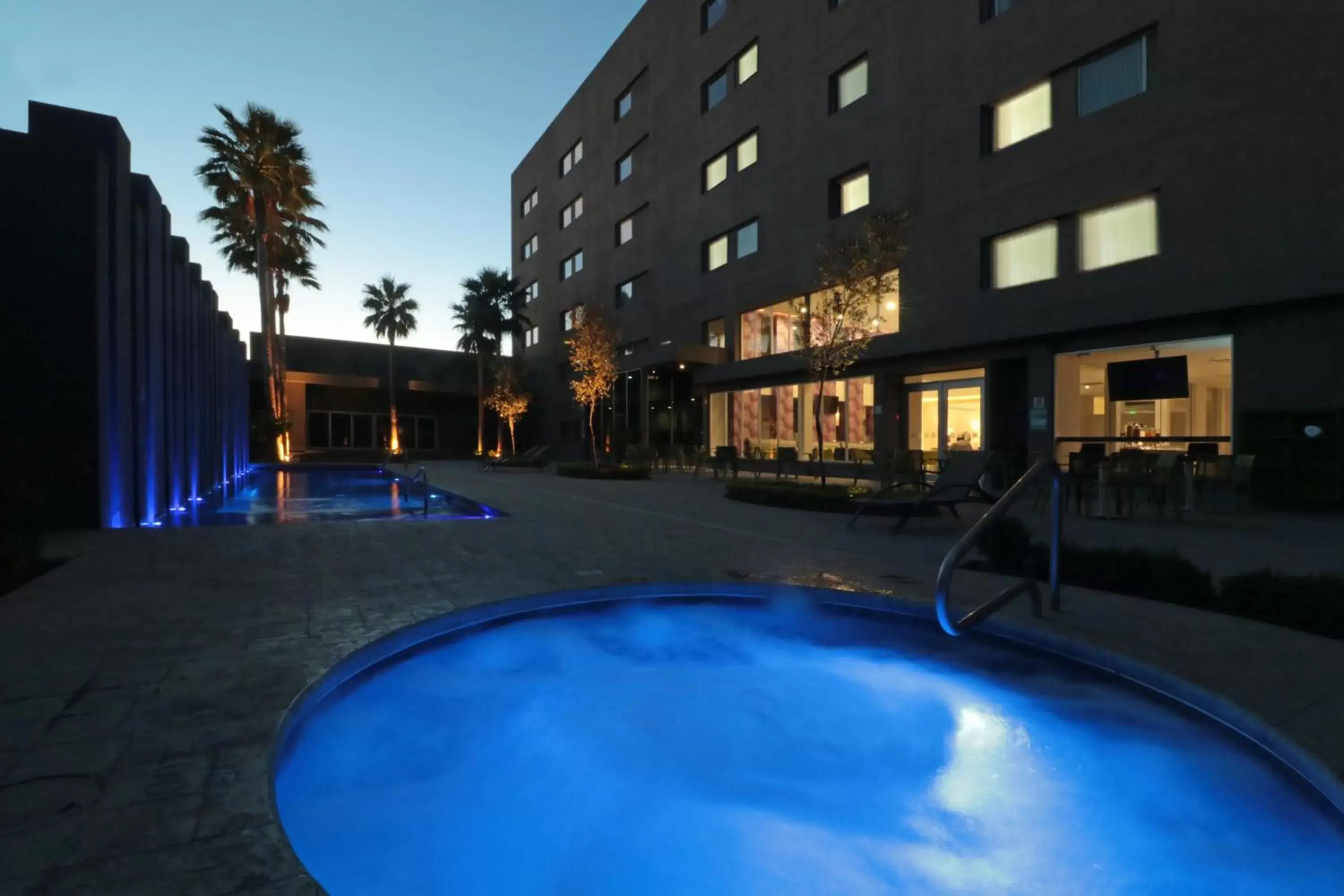 Swimming pool, Property Building in Holiday Inn Express Hotel & Suites Hermosillo, an IHG Hotel