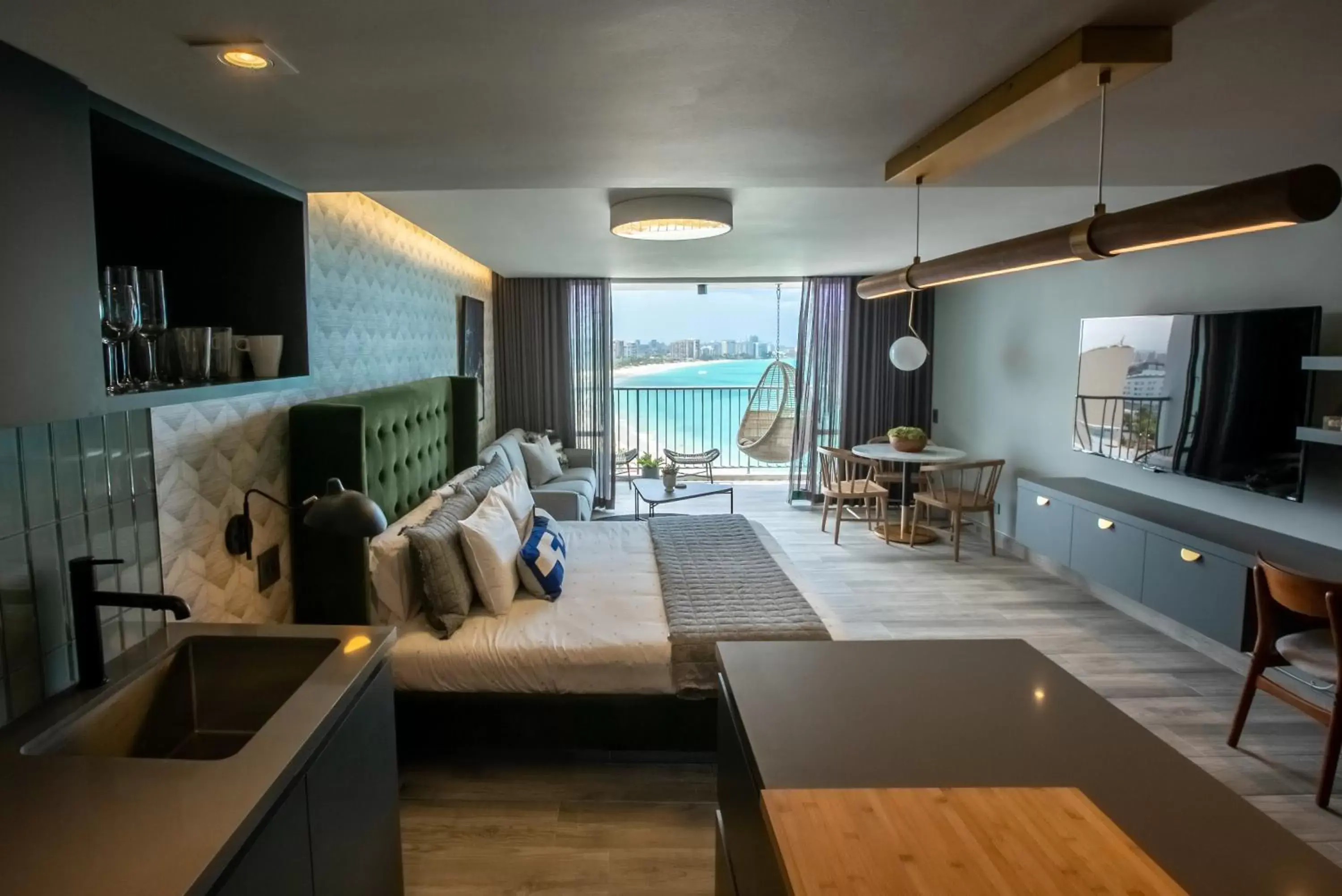 Living room in OCEAN VIEW DELUXE SUITE: PVT. BEACH & POOL