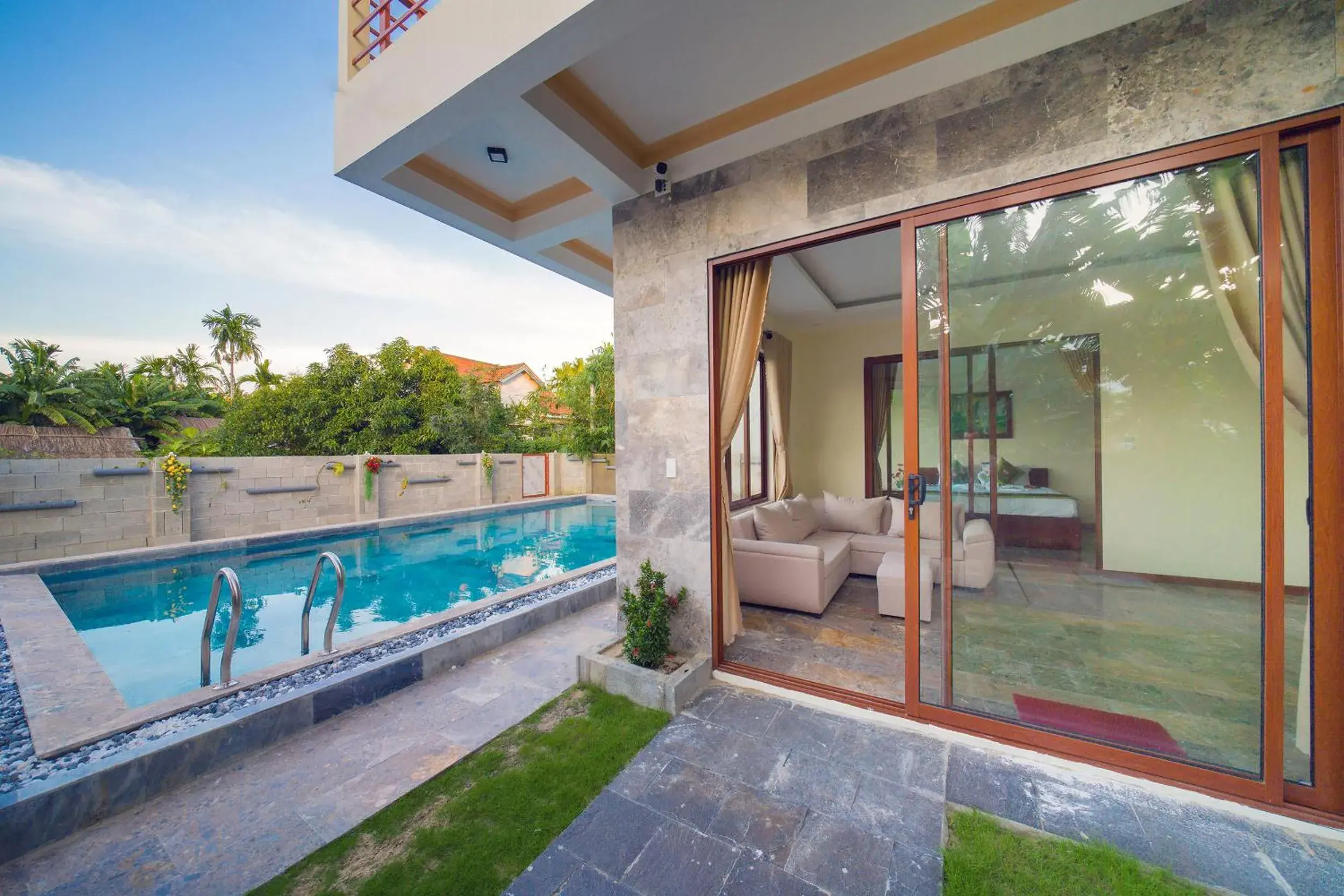 Living room, Swimming Pool in Herbal Tea Homestay