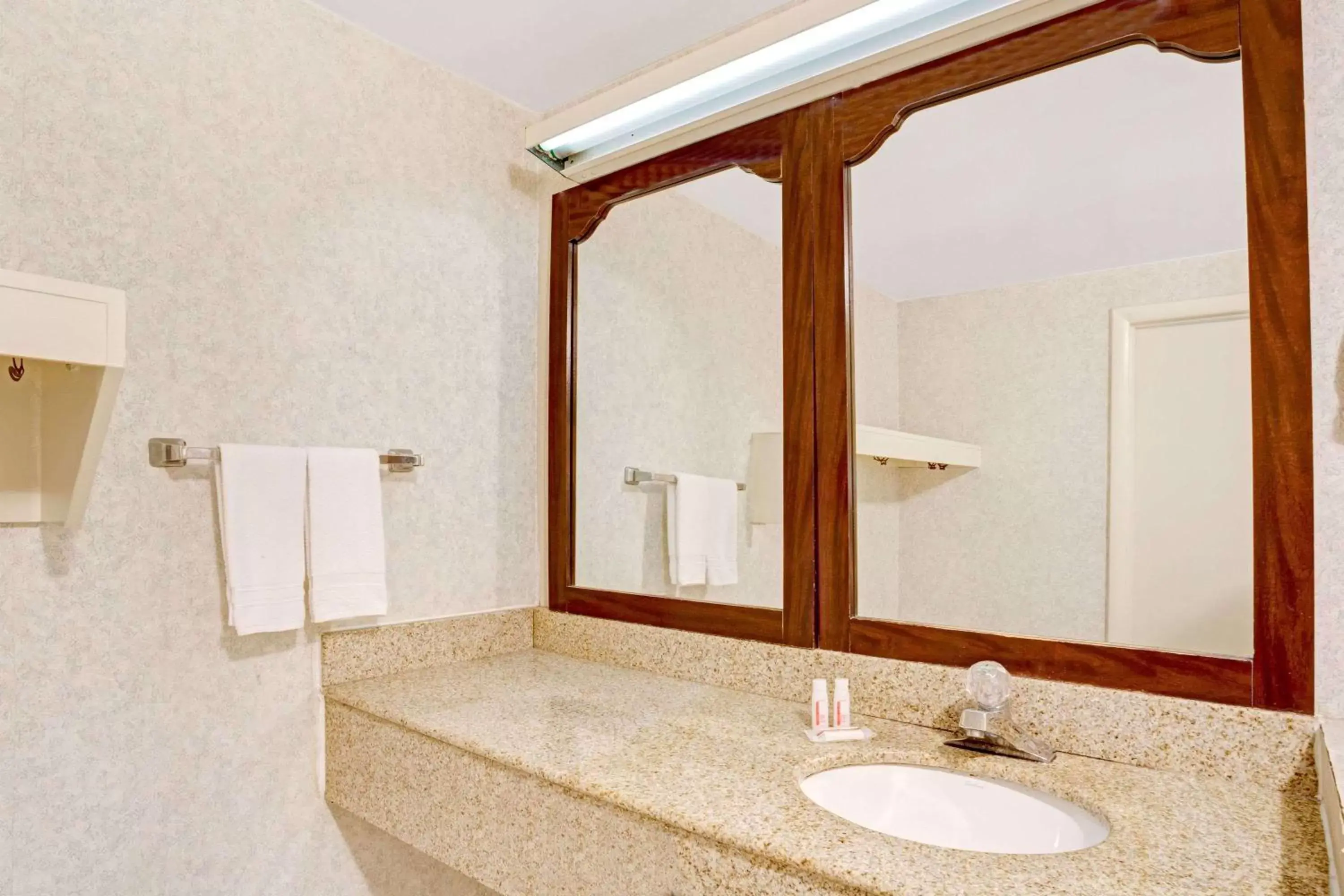 Bathroom in Super 8 by Wyndham Fredericksburg