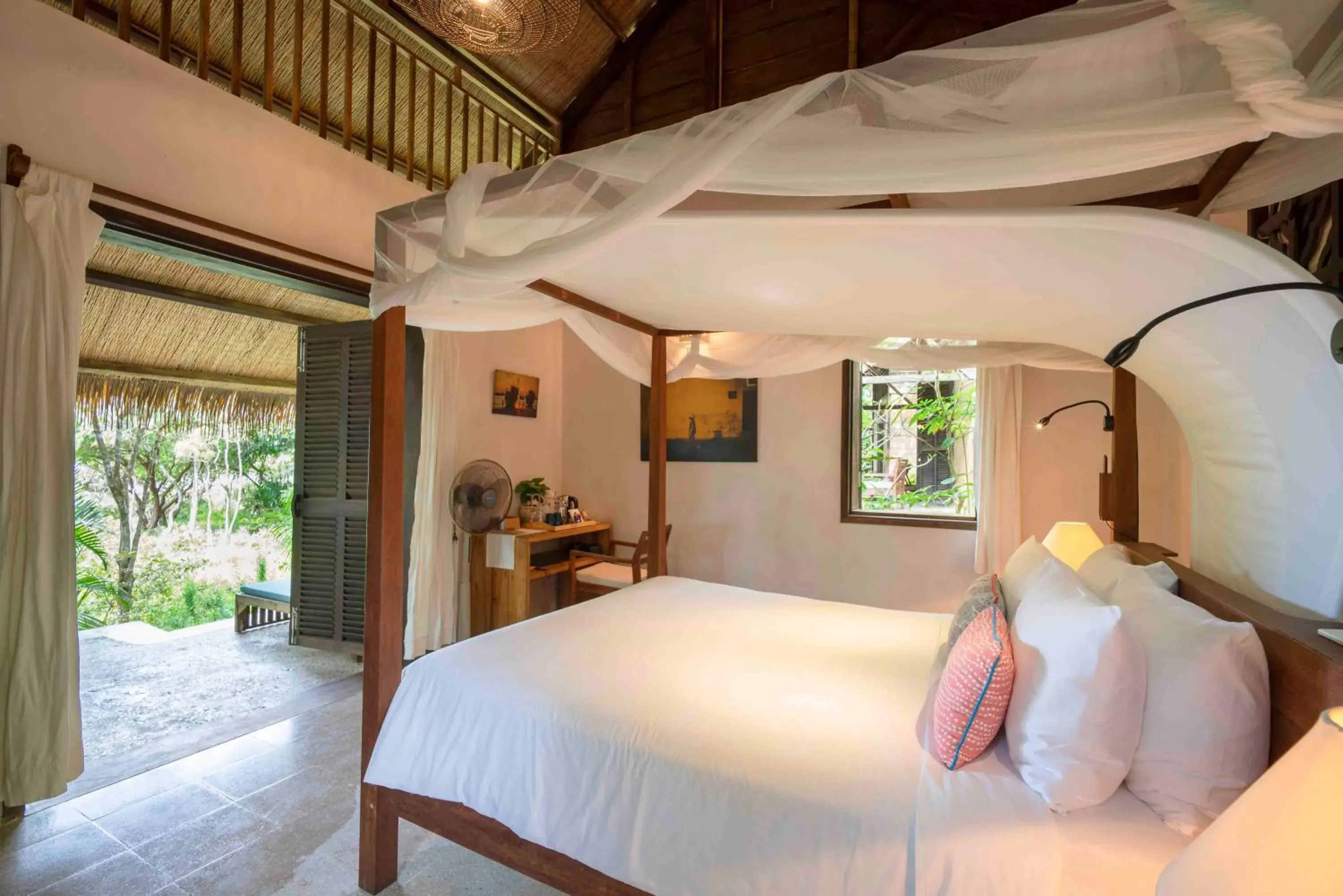 Bed in Mango Bay Resort Bed in Mango Bay Resort