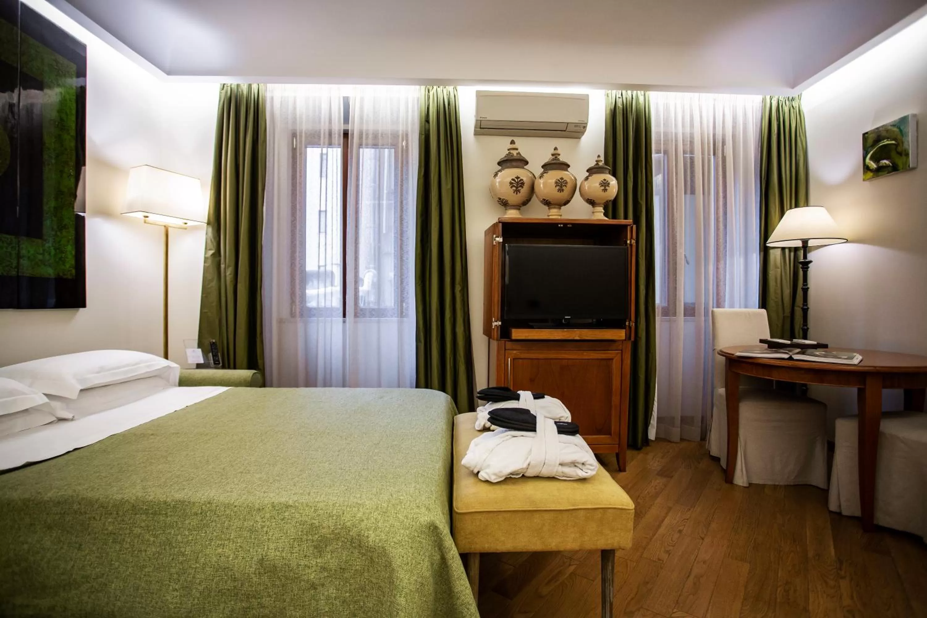 Bed in Hotel Adriano