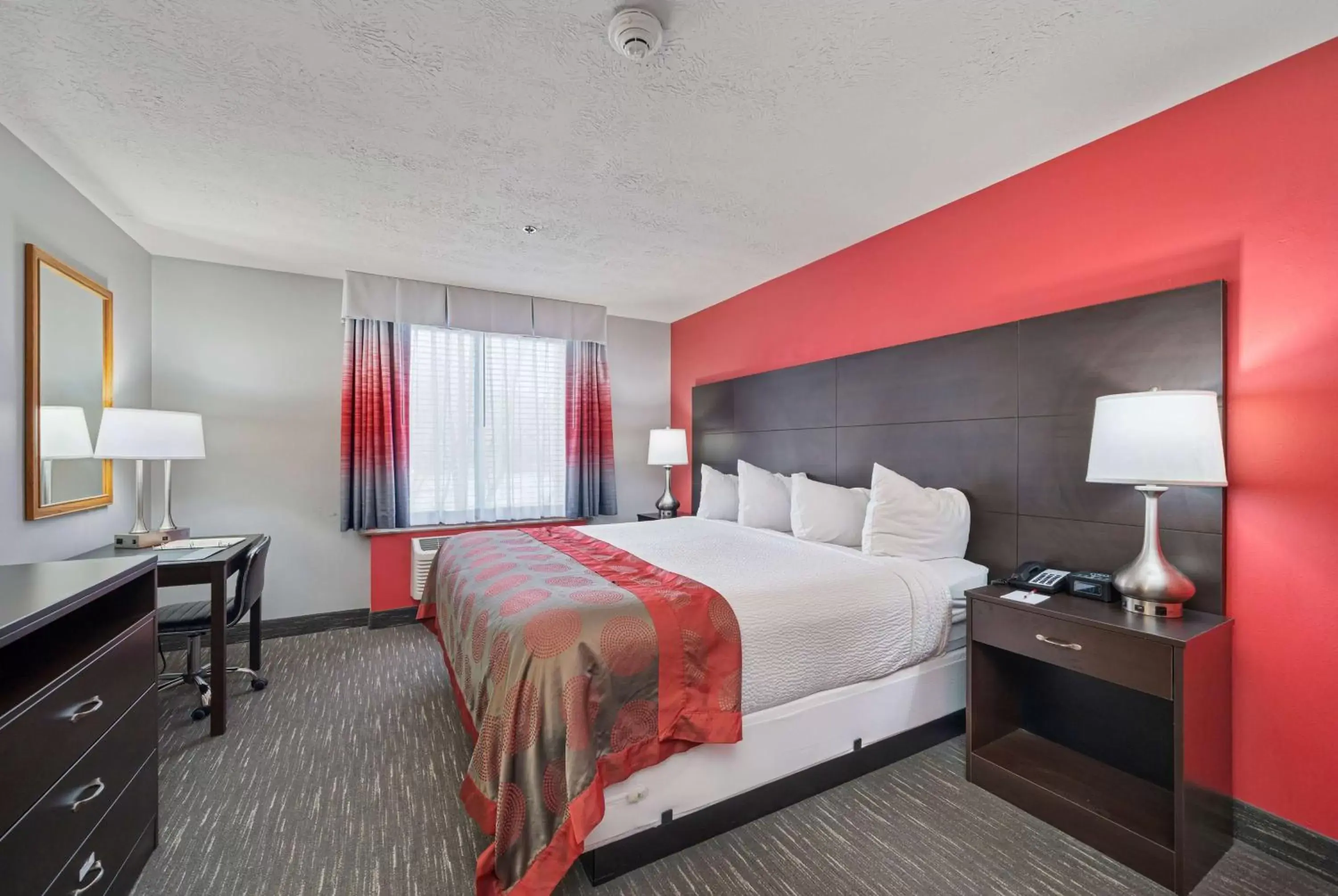 Photo of the whole room, Bed in Ramada by Wyndham Sioux Falls Airport - Waterpark Resort & Event Center